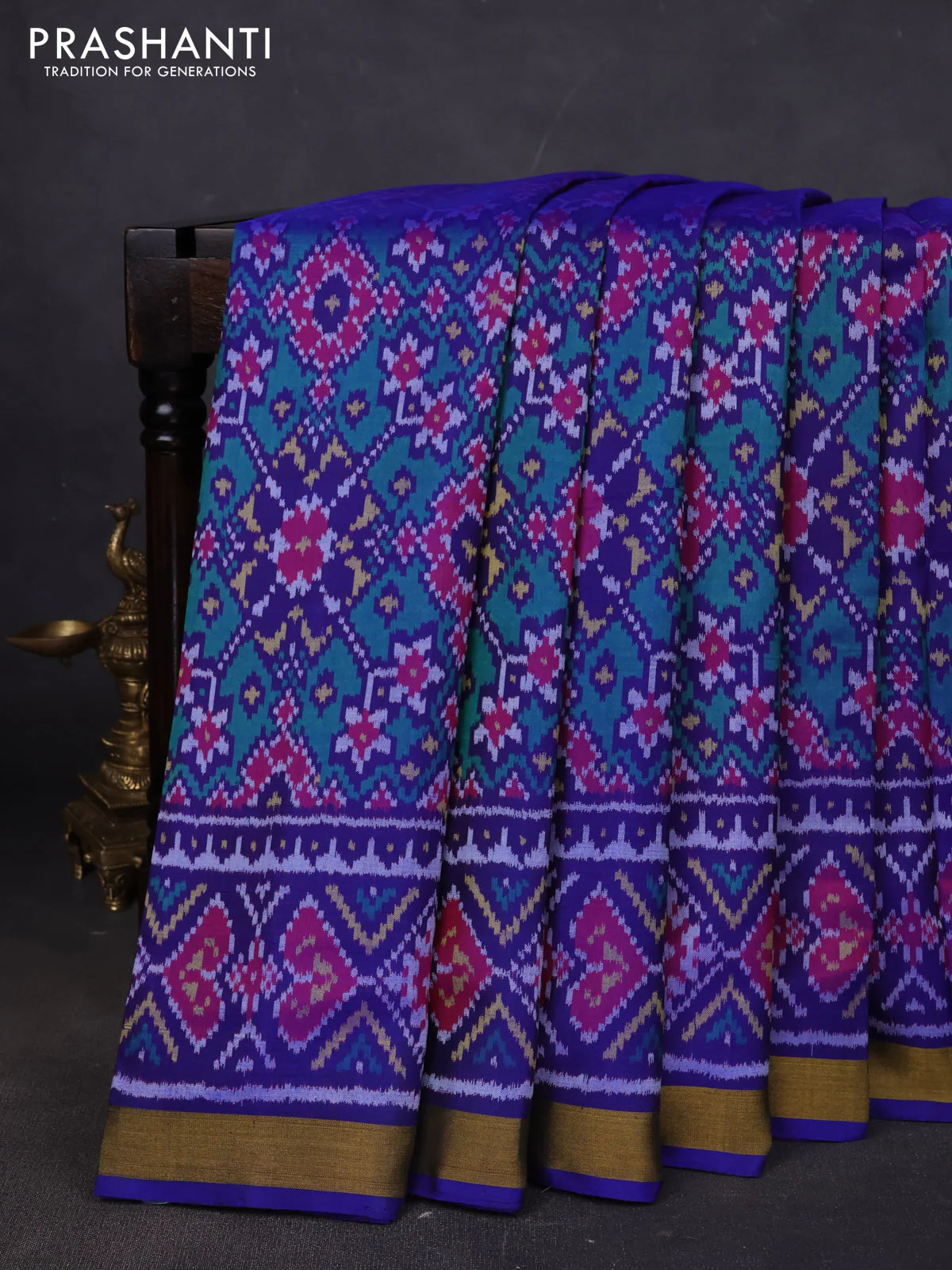 Rajkot patola silk saree blue with allover ikat weaves and ikat woven zari border