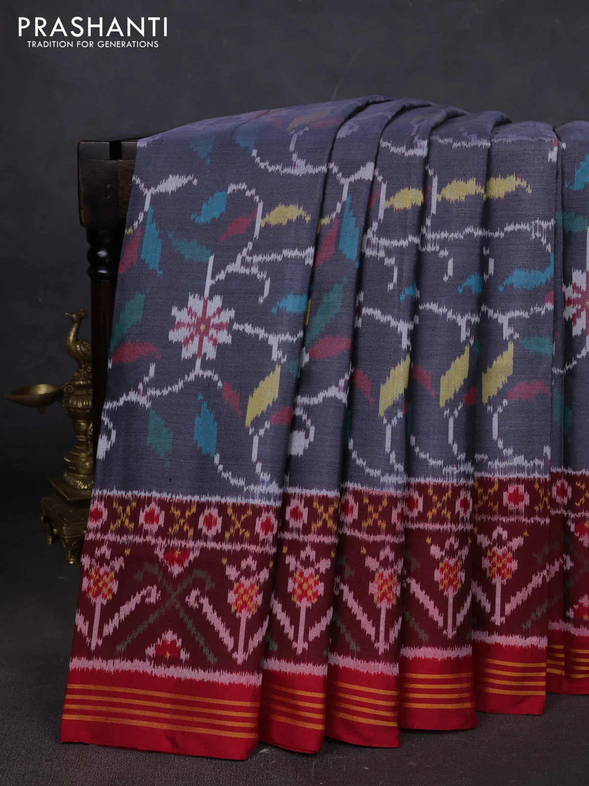 Rajkot patola silk saree dark grey and maroon with allover ikat weaves and ikat woven border