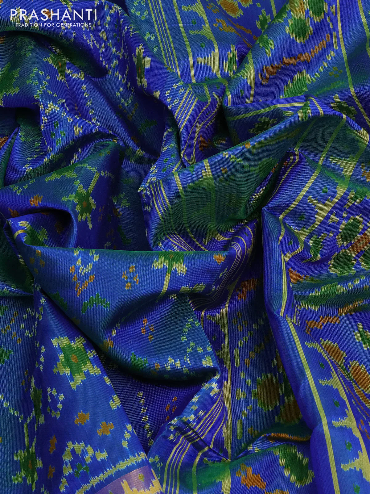 Rajkot patola silk saree dual shade of greenish blue with allover ikat weaves and ikat woven zari border - Image 3