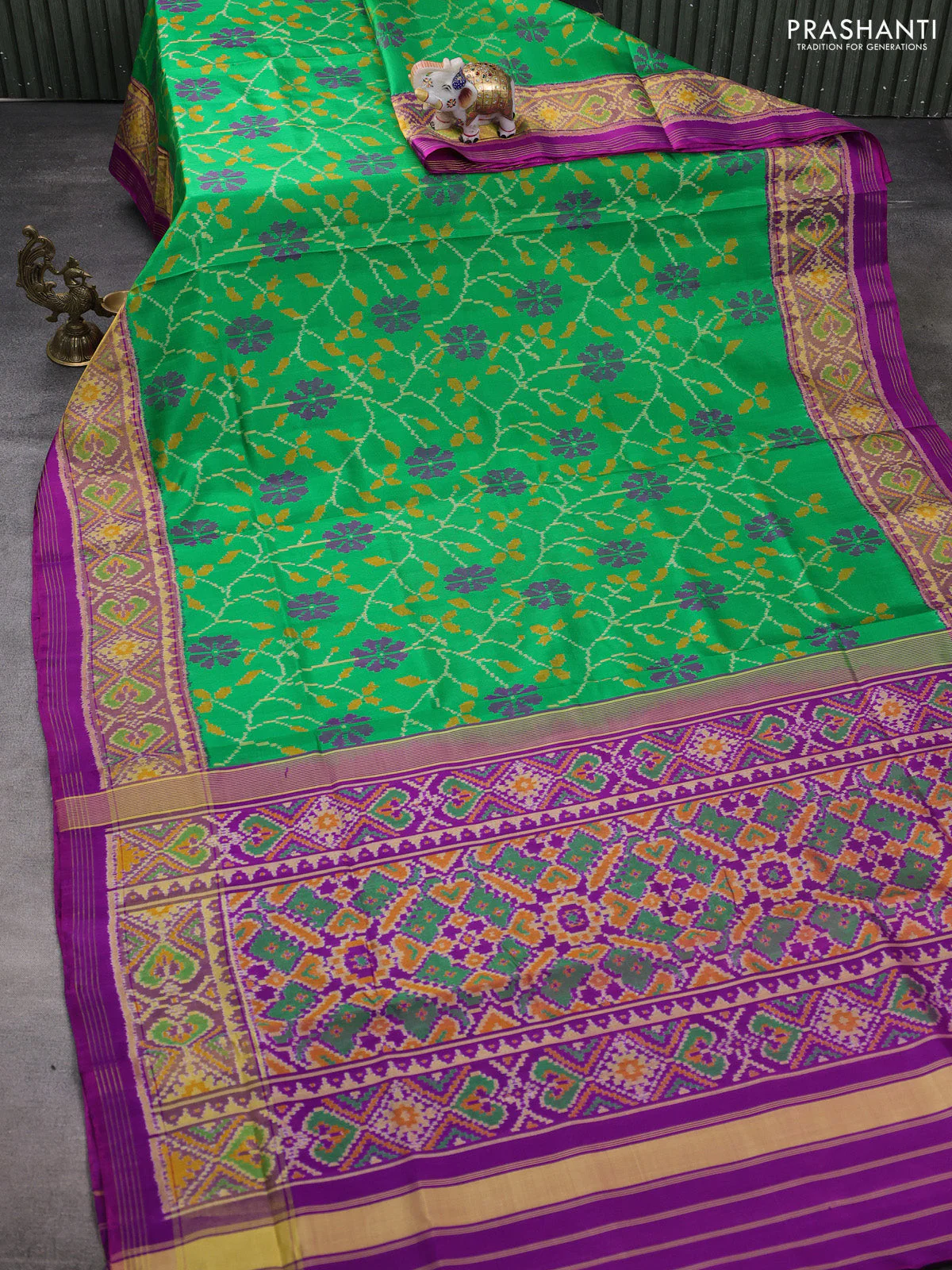 Rajkot patola silk saree green and purple with allover ikat weaves and ikat woven border - Image 2