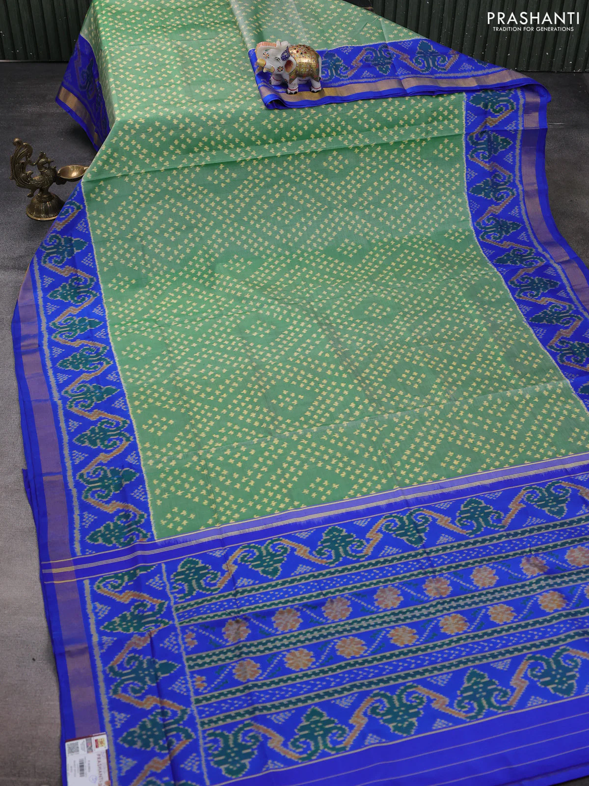 Rajkot patola silk saree green and royal blue with allover ikat weaves and ikat woven zari border - Image 2