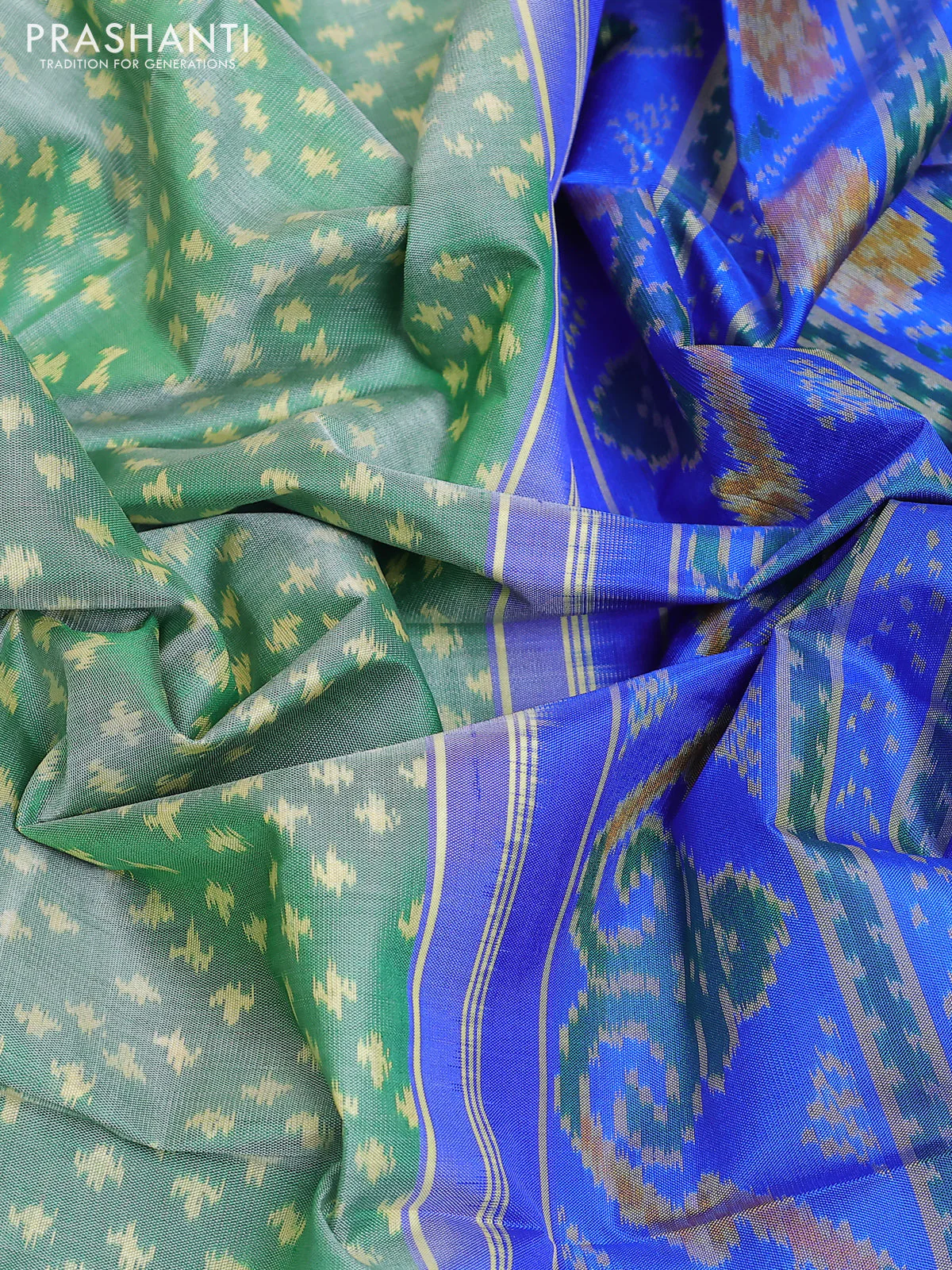 Rajkot patola silk saree green and royal blue with allover ikat weaves and ikat woven zari border - Image 3