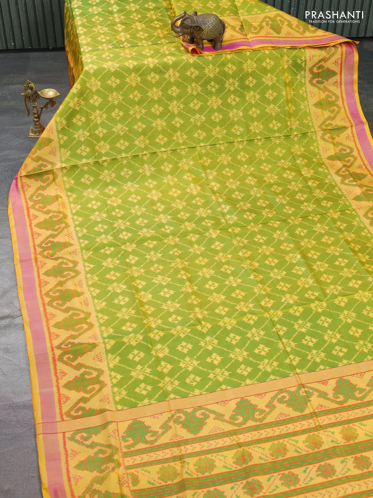 Rajkot patola silk saree light green and yellow with allover ikat weaves and ikat woven border - Image 2