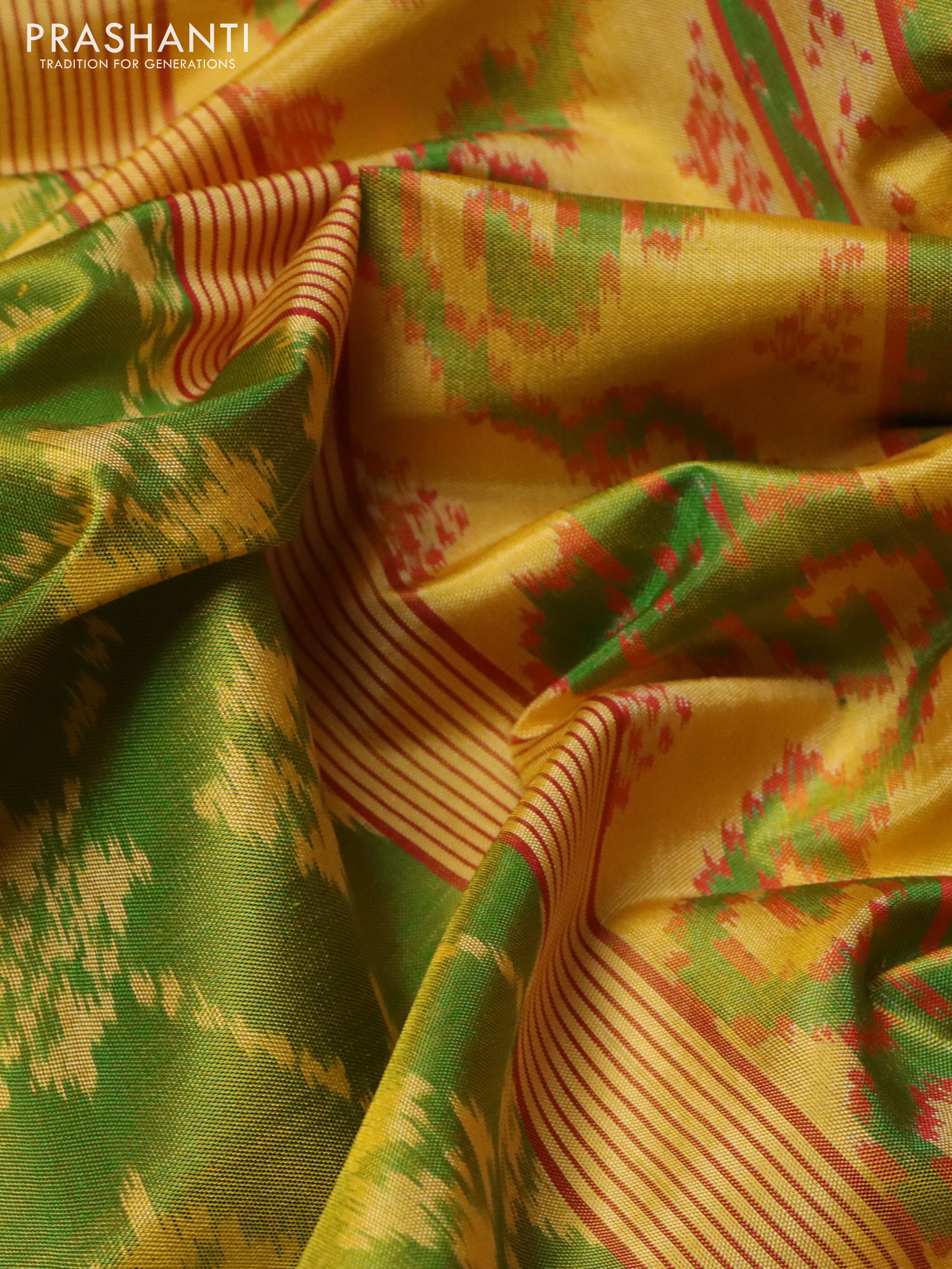 Rajkot patola silk saree light green and yellow with allover ikat weaves and ikat woven border - Image 3