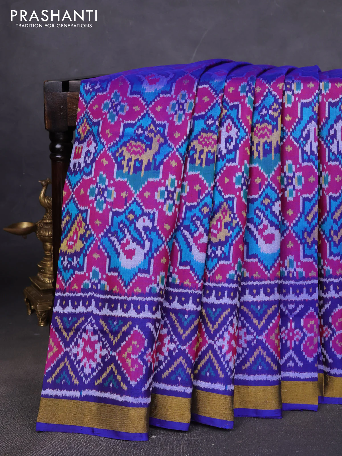 Rajkot patola silk saree maroon and blue with allover patola weaves and ikat woven zari border