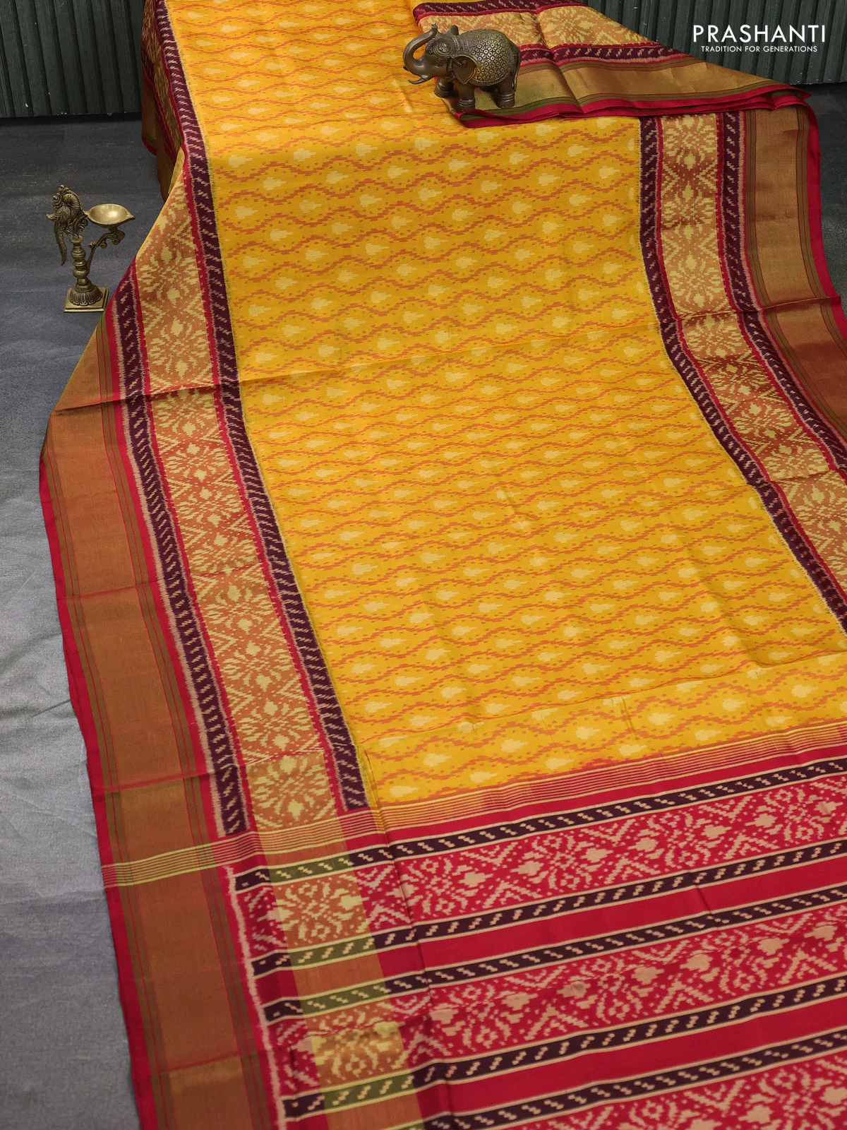 Rajkot patola silk saree mustard yellow and red with allover ikat weaves and zari woven border - Image 2