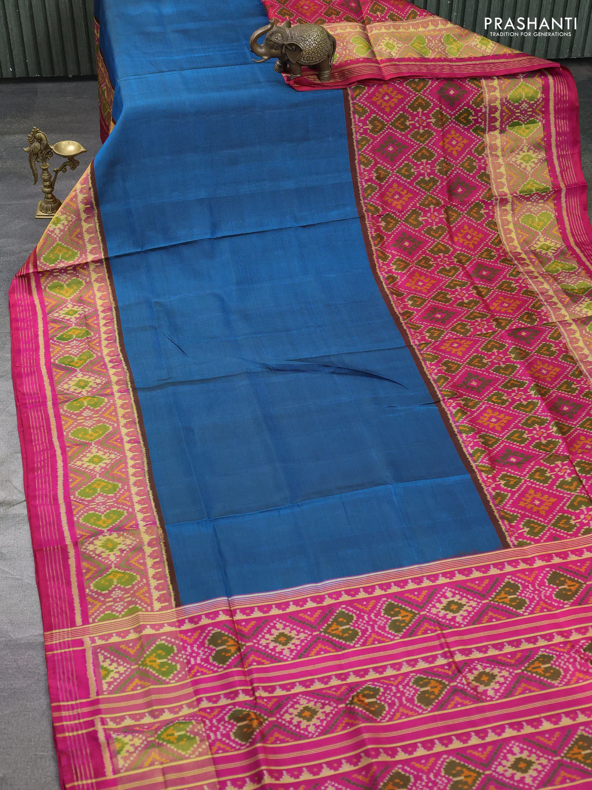 Rajkot patola silk saree peacock blue and pink with plain body and long ikat woven zari border - Image 2
