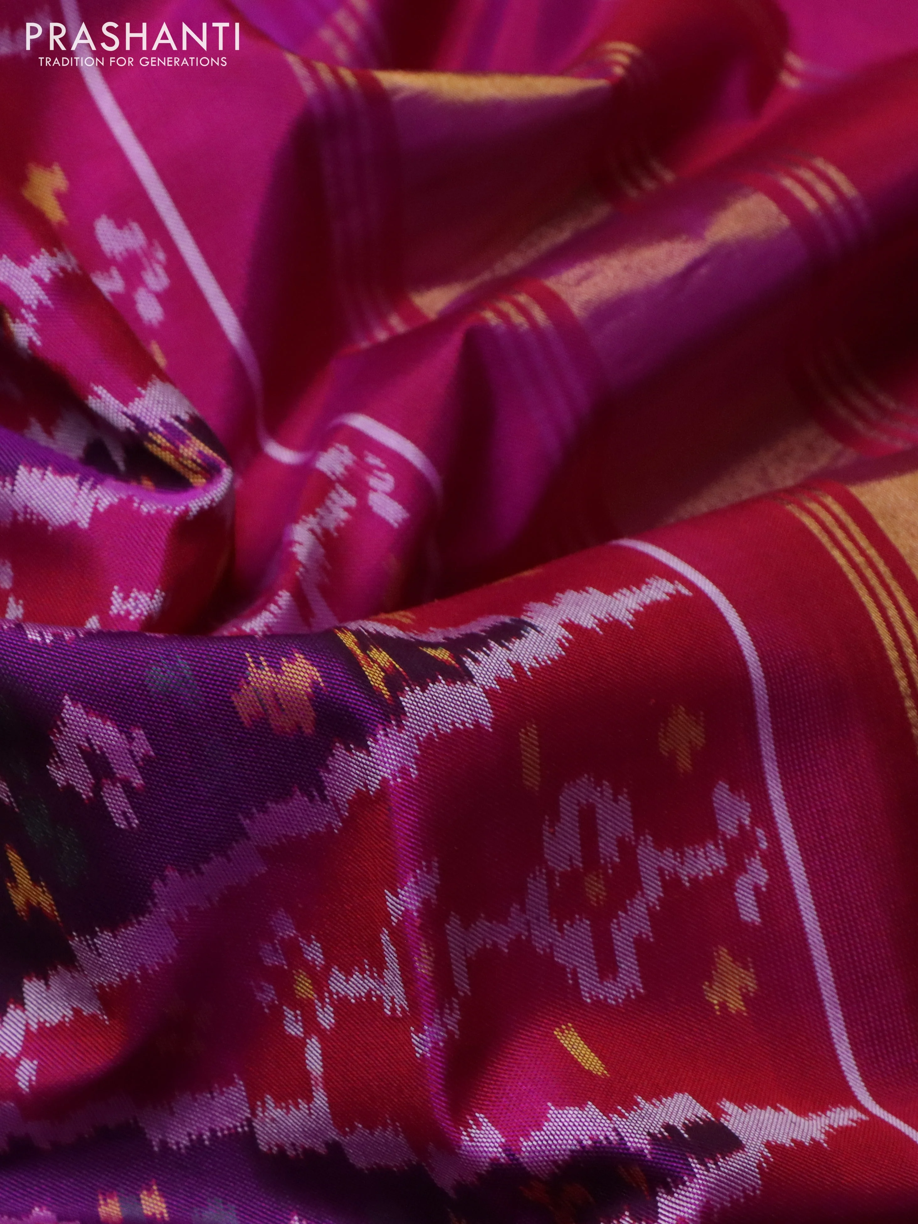 Rajkot patola silk saree purple and darl magenta pink with allover ikat weaves and ikat woven border - Image 3