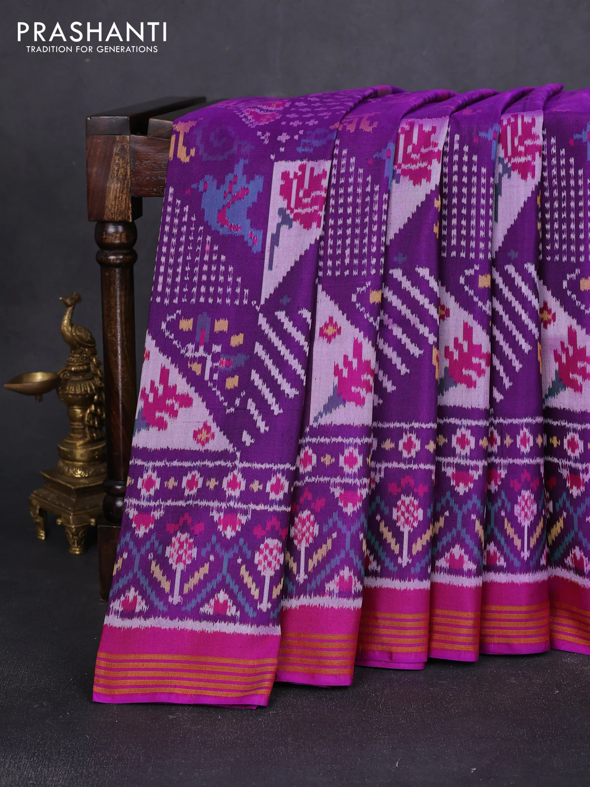 Rajkot patola silk saree purple and magenta pink with allover ikat weaves and ikat woven border