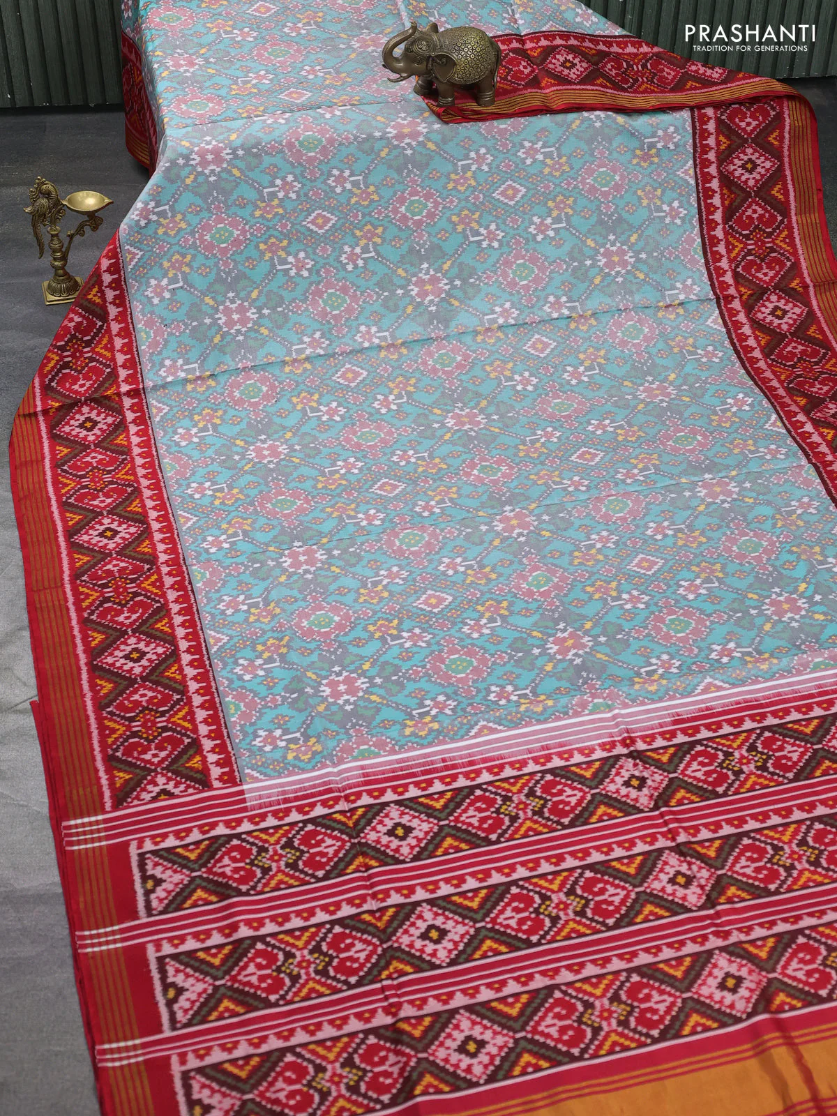 Rajkot patola silk saree tea l blue and red with allover ikat weaves and ikat woven zari border - Image 2