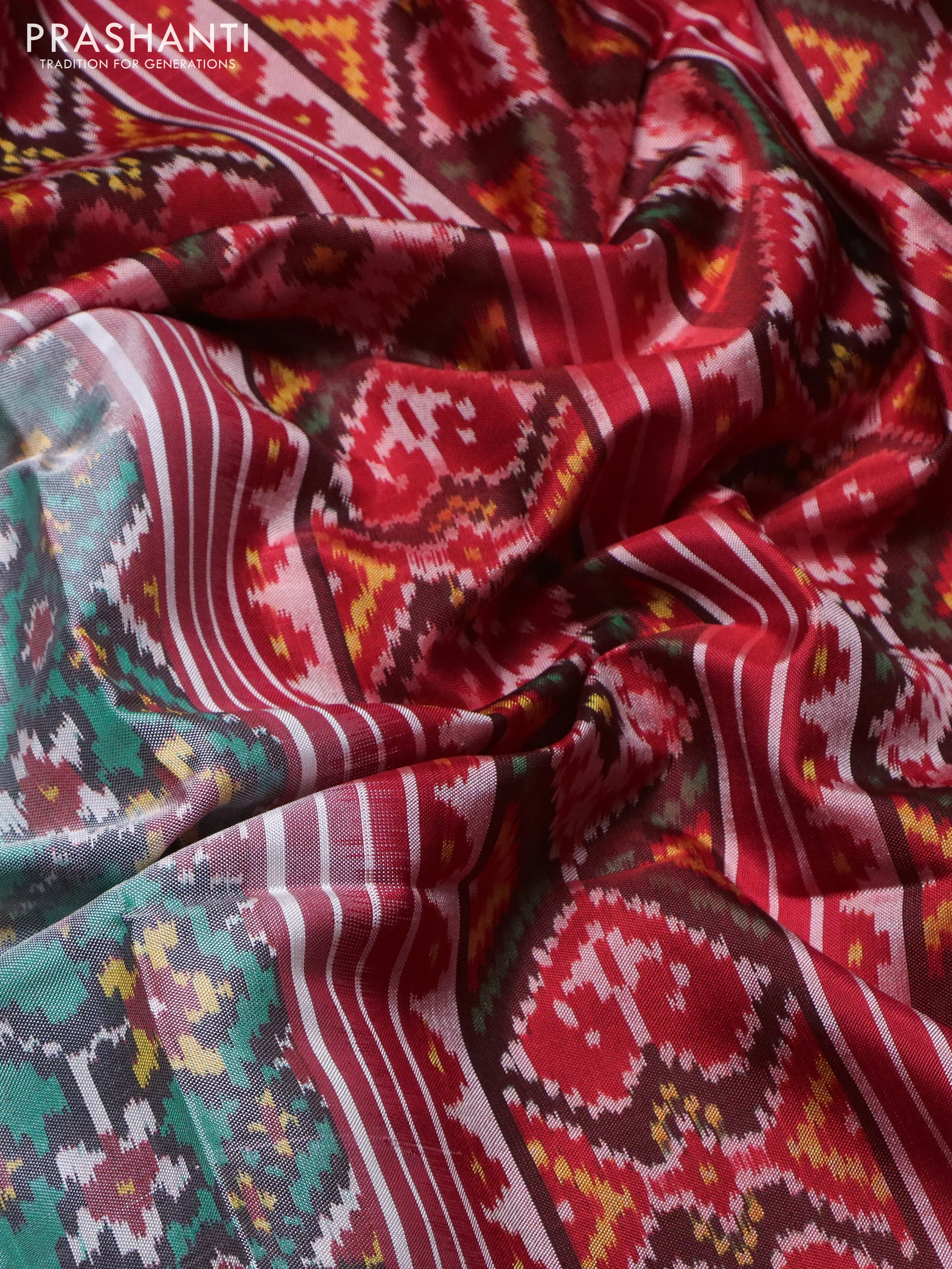 Rajkot patola silk saree tea l blue and red with allover ikat weaves and ikat woven zari border - Image 3