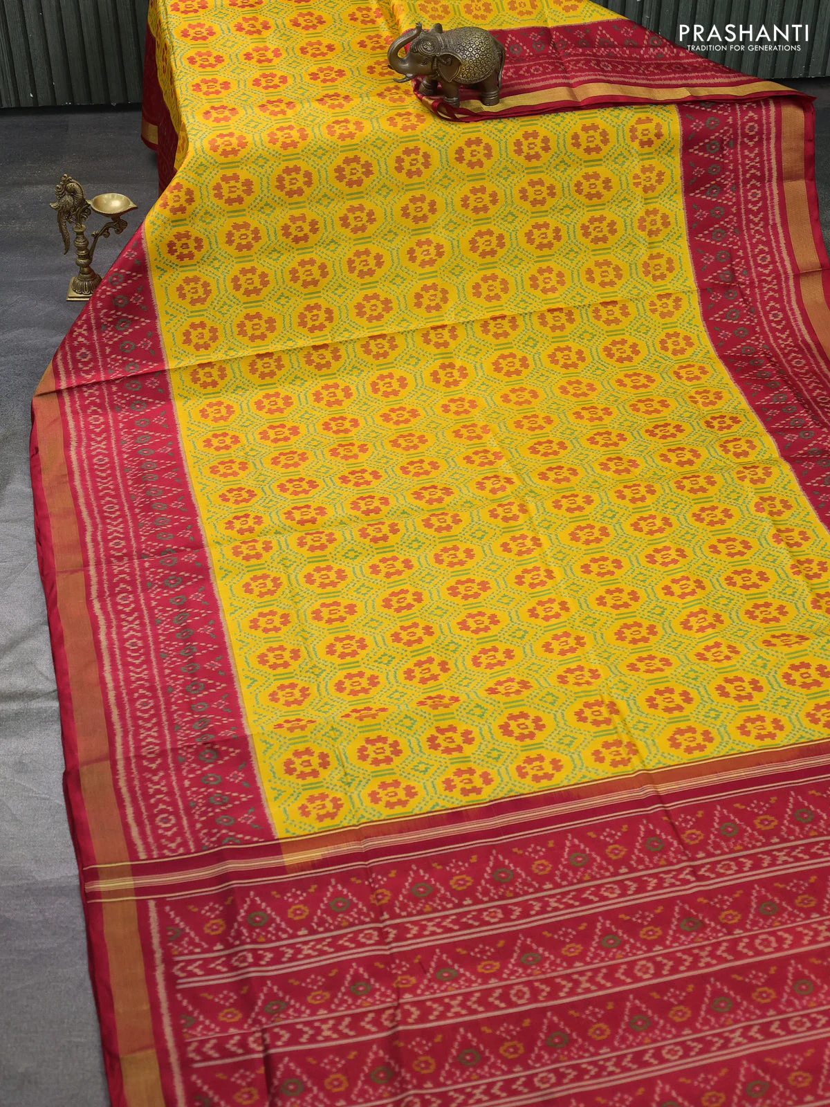 Rajkot patola silk saree yellow and red with allover ikat weaves and long ikat woven zari border - Image 2