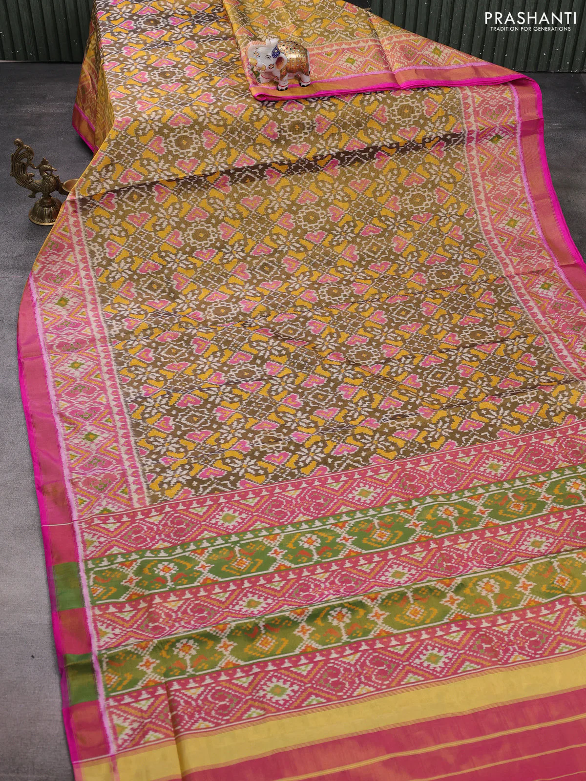 Rajkot patola tissue silk saree mehendi green and pink with allover ikat weaves and ikat woven zari border - Image 2
