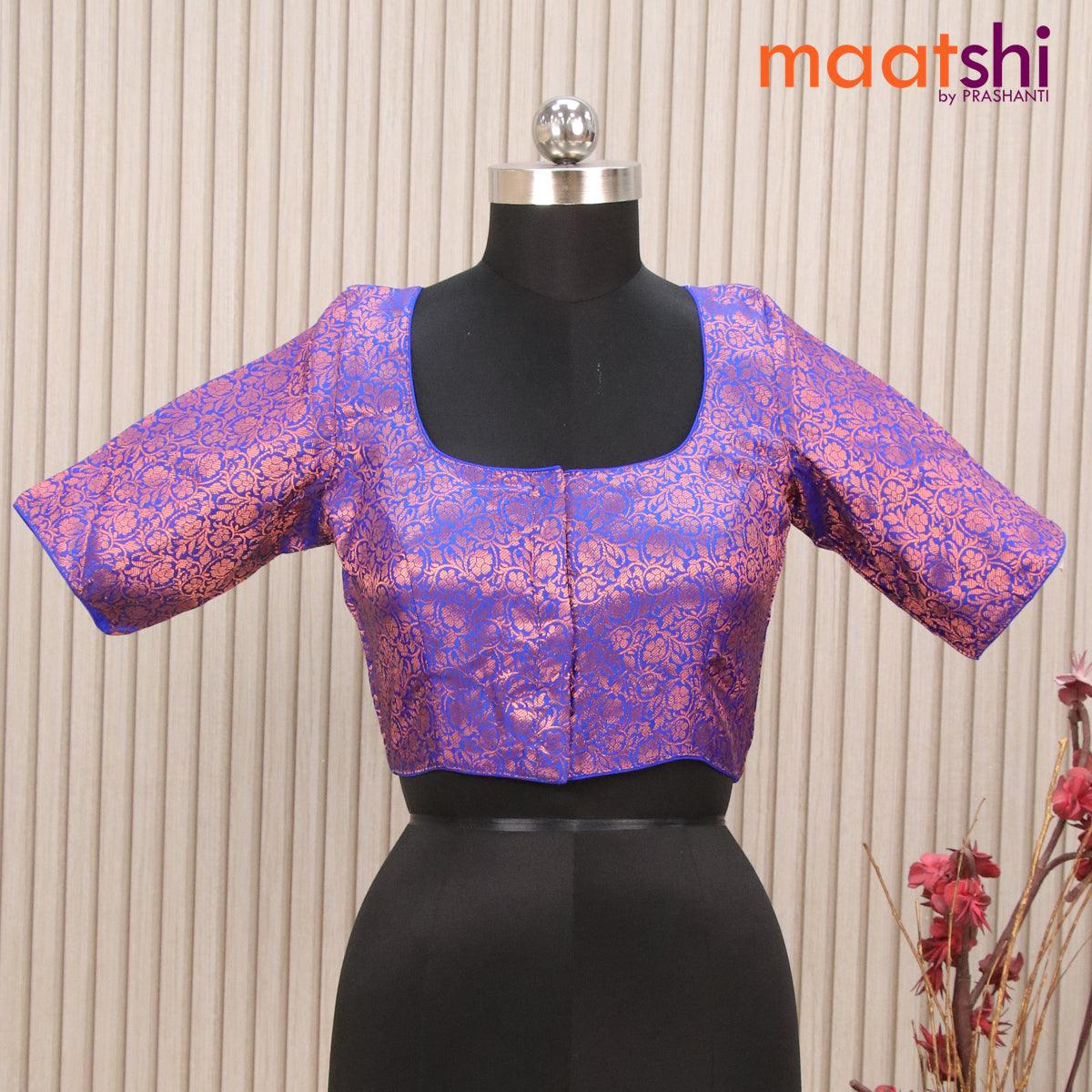 Readymade brocade blouse blue with allover copper zari weaves and back knot