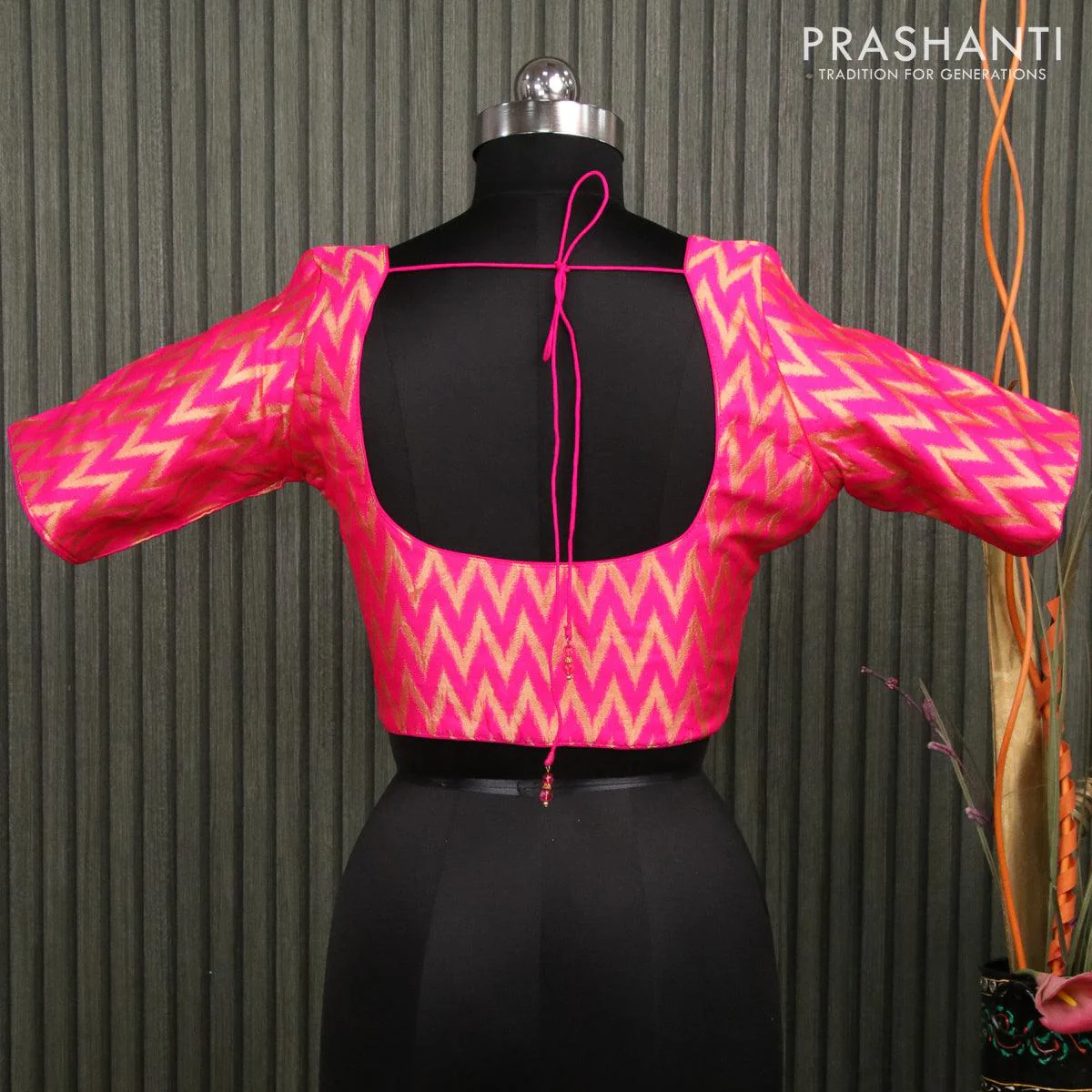 Readymade brocade blouse candy pink with allover ikat zari weaves and back knot - Image 2