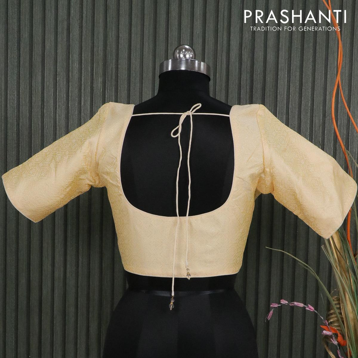 Readymade brocade blouse cream with allover brocade weaves and back knot - Image 2