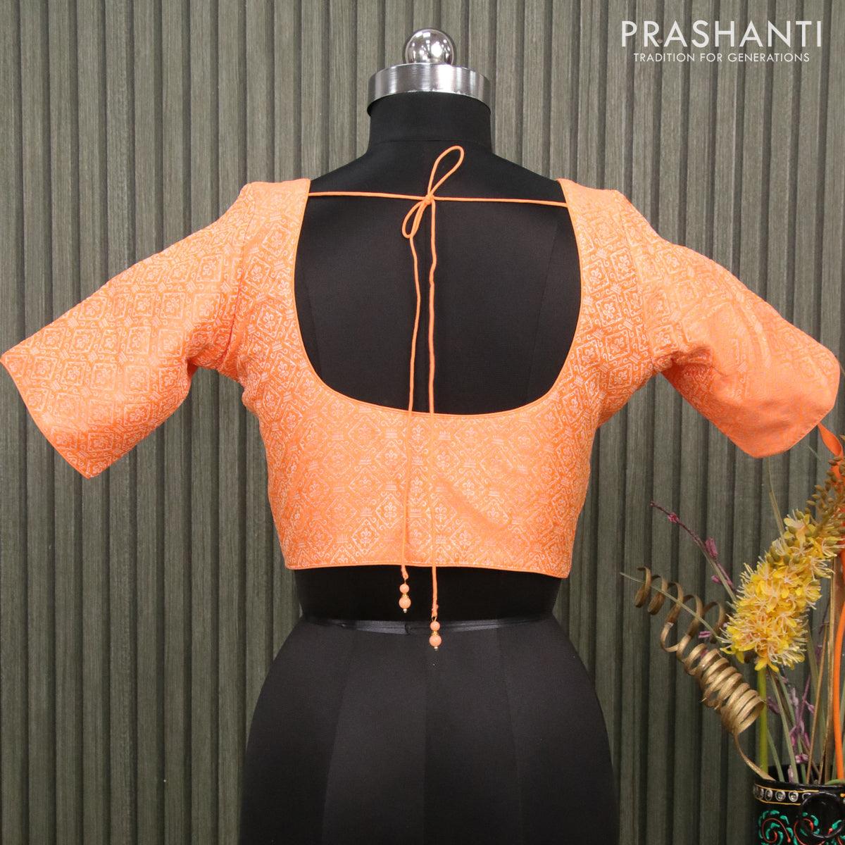 Readymade brocade blouse orange with allover brocade weaves and back knot - Image 2