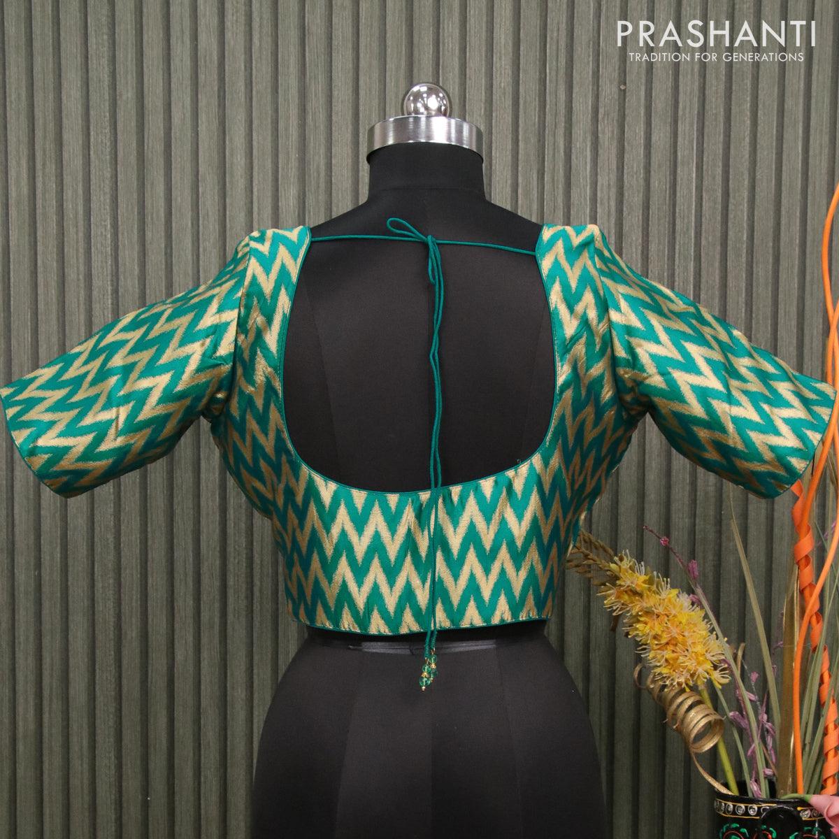 Readymade brocade blouse teal blue with allover ikat zari weaves and back knot - Image 2