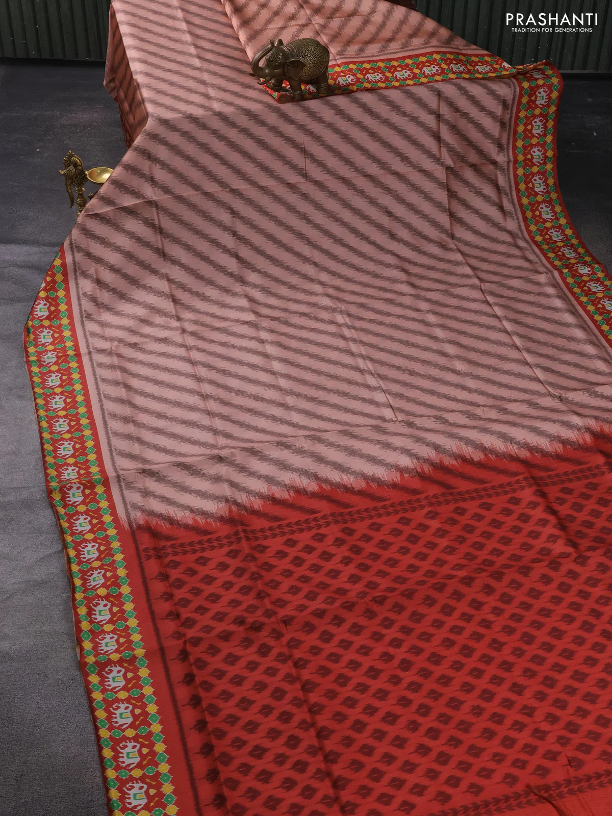 Sambalpuri semi silk saree pale orange and rustic orange with allover leheriya ikat weaves and patola printed border - Image 2