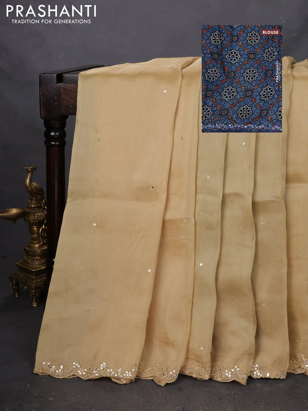 Satin crepe silk saree sandal and blue with mirror work and ajrakh printed blouse