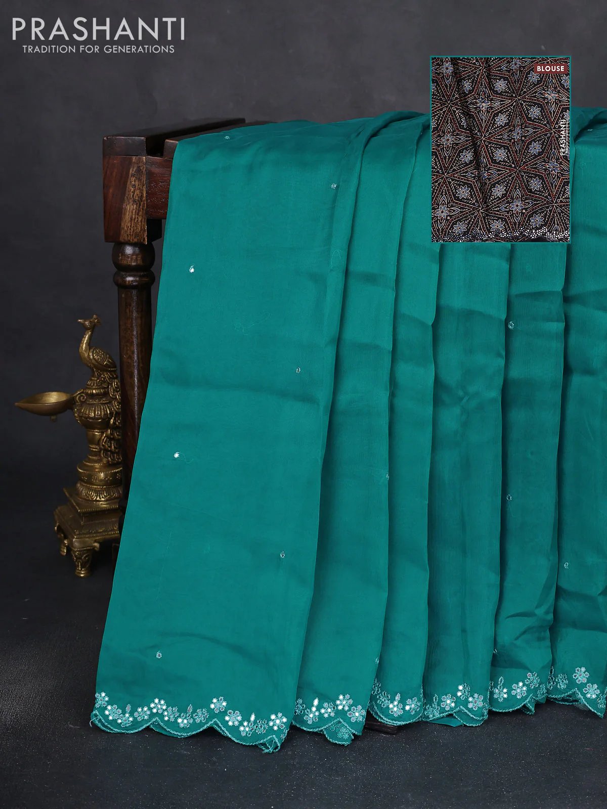 Satin crepe silk saree teal blue and black with allover mirror work and ajrakh printed blouse