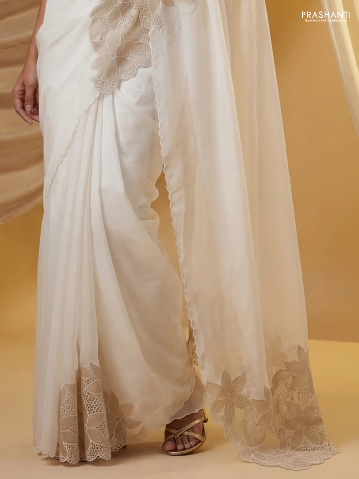Satin Organza saree off white with plain body and floral design cut work border - Image 3