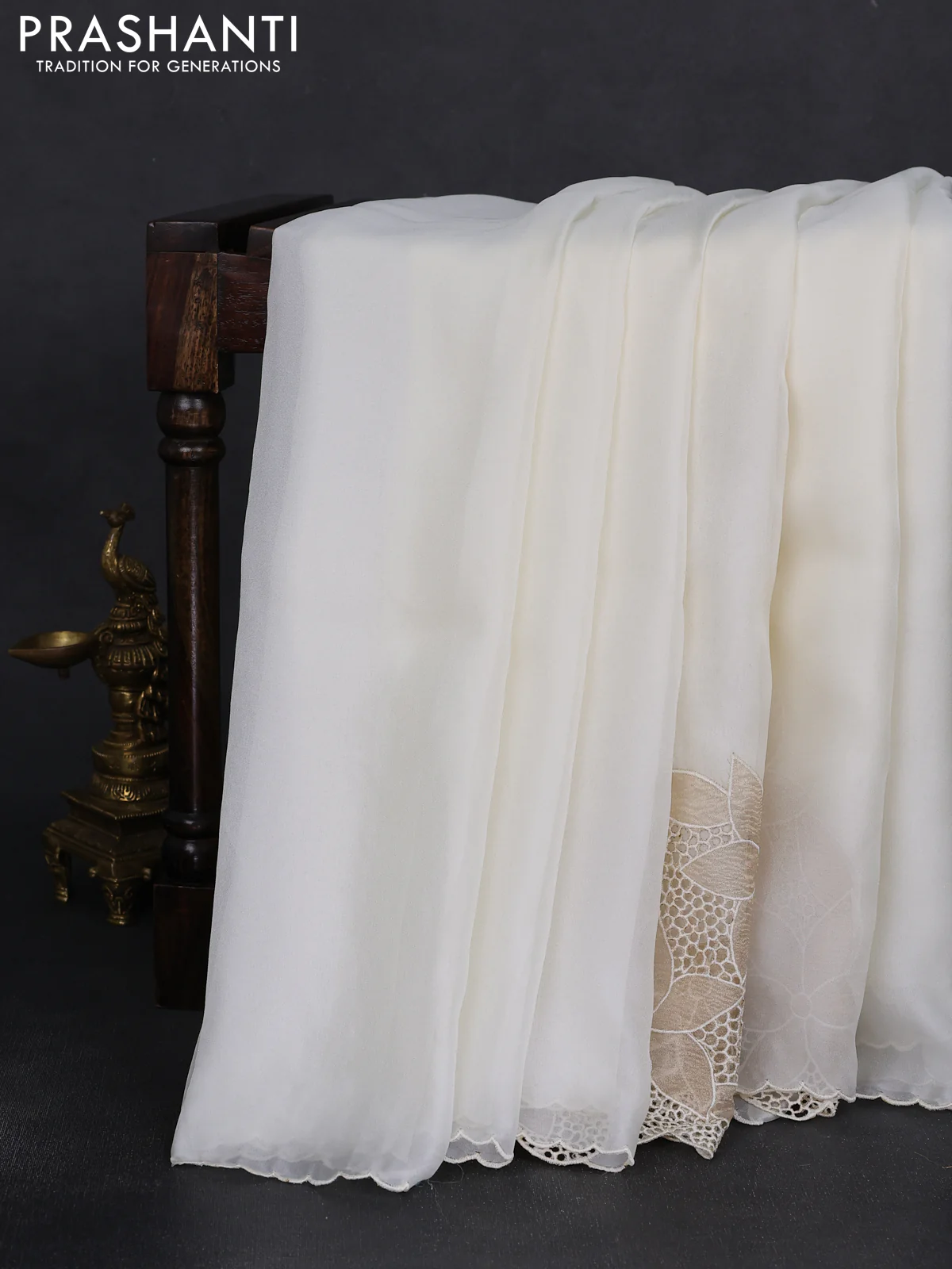Satin Organza saree off white with plain body and floral design cut work border - Image 6