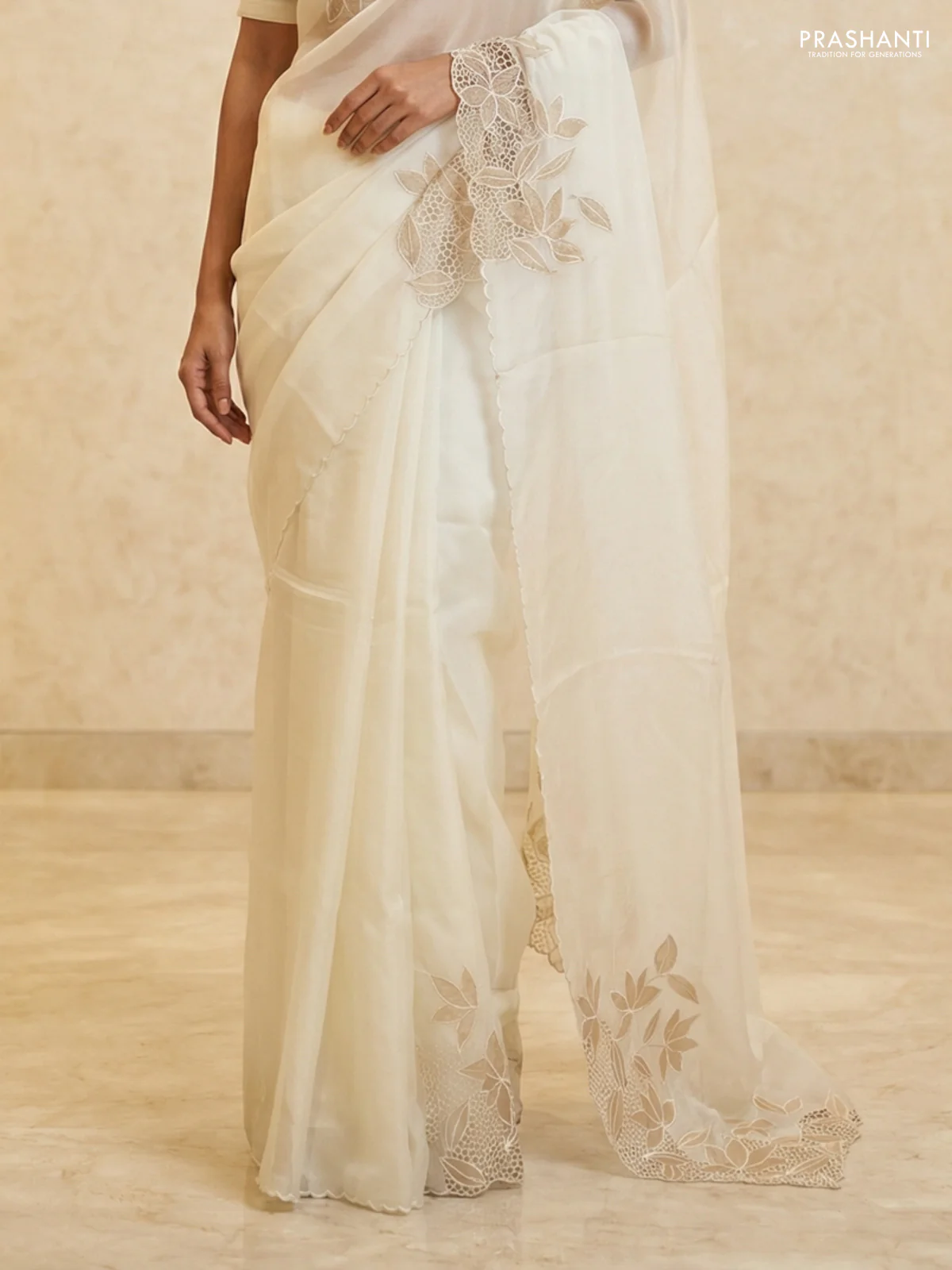 Satin Organza saree off white with plain body and floral design cut work border - Image 3