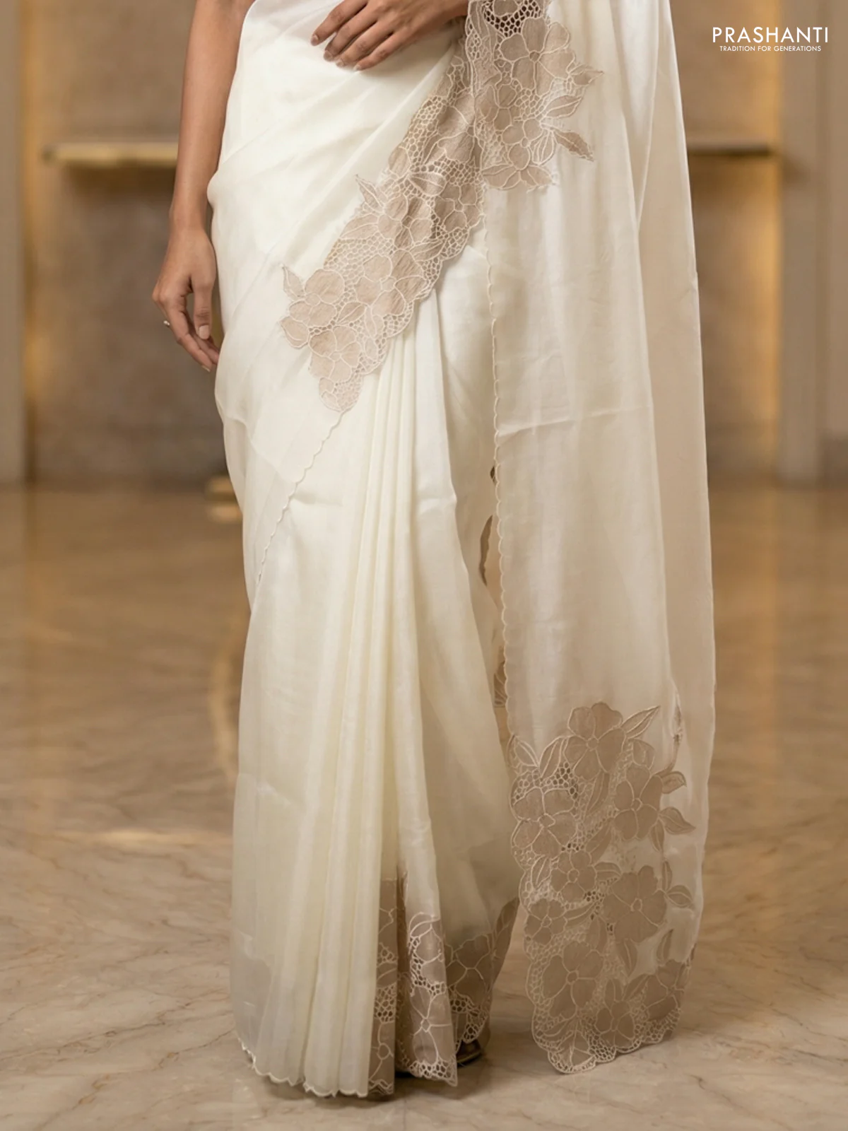 Satin Organza saree off white with plain body and floral design cut work border - Image 3