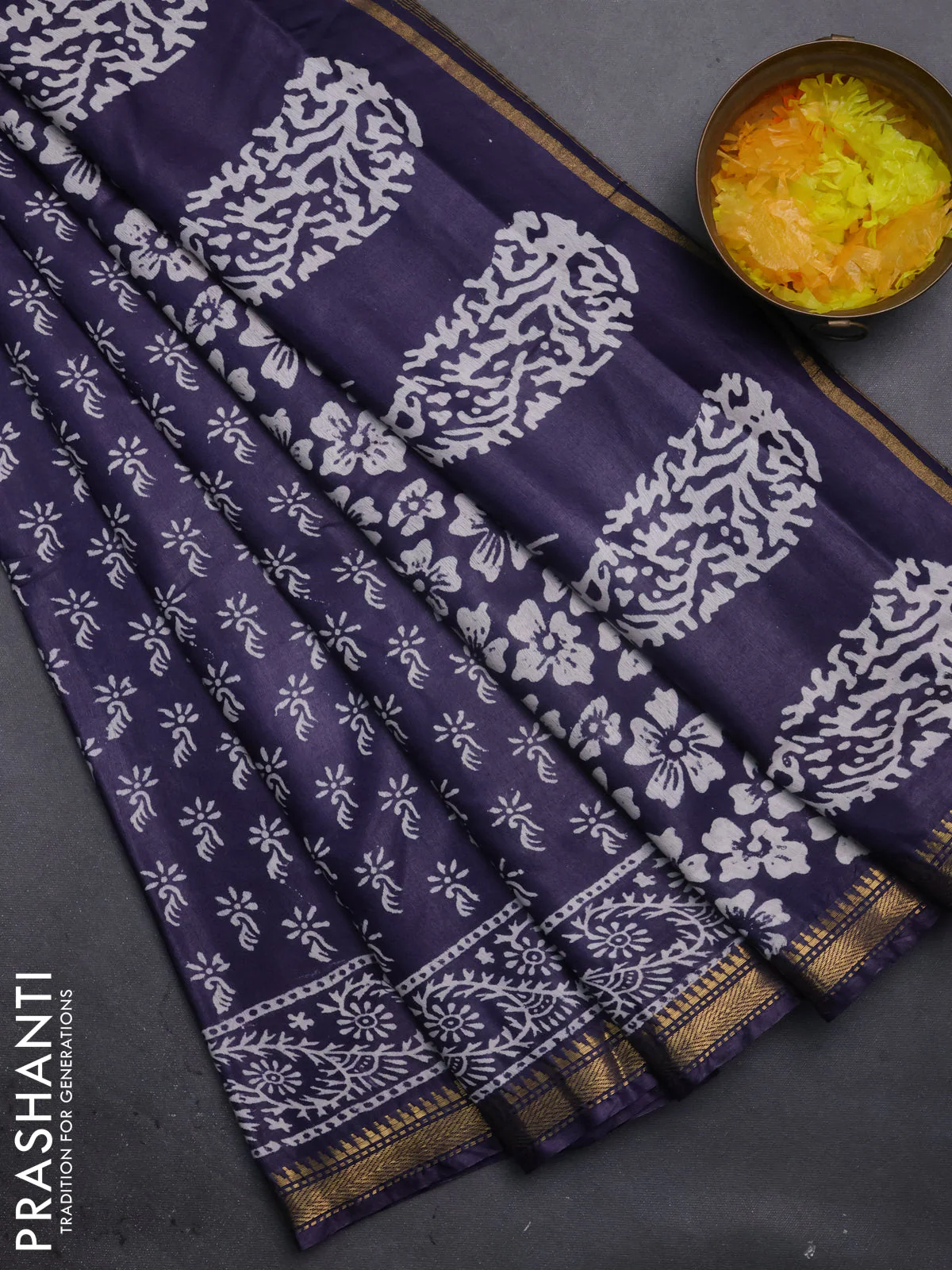 Semi bhagalpuri saree deep jamun with allover prints and zari woven border