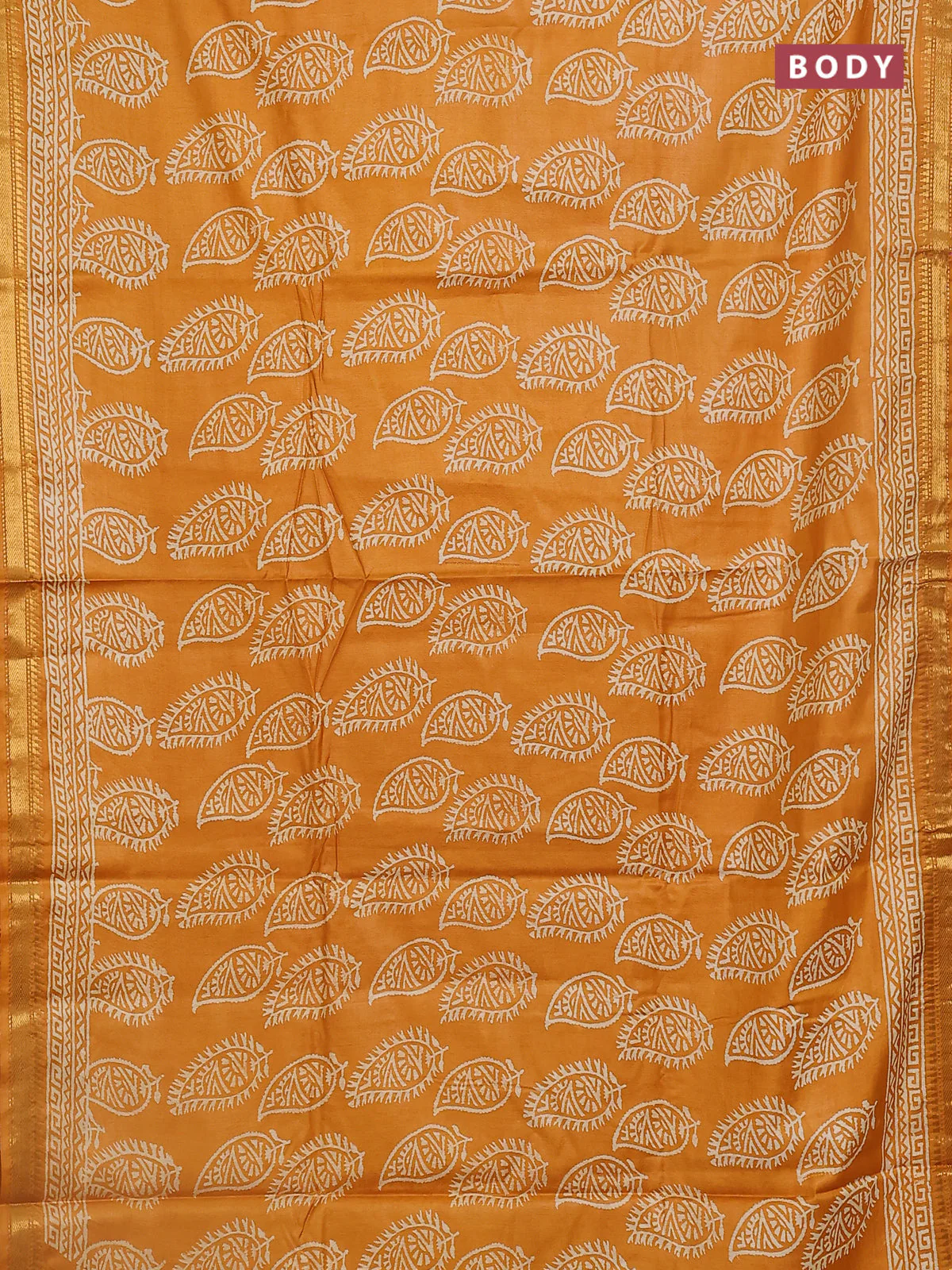 Semi bhagalpuri saree mustard yellow with allover prints and zari woven border - Image 2