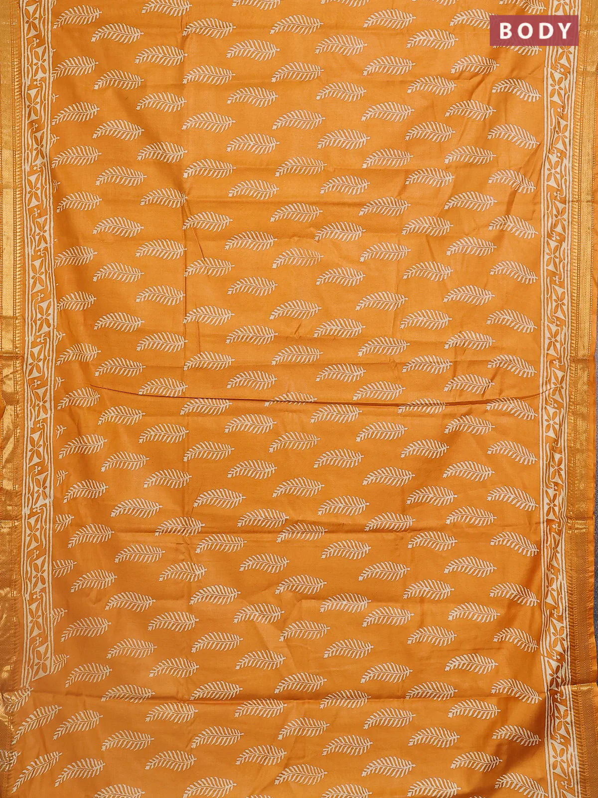 Semi bhagalpuri saree mustard yellow with allover prints and zari woven border - Image 2