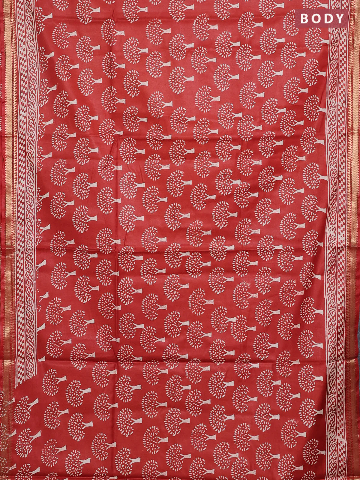 Semi bhagalpuri saree rust with allover prints and zari woven border - Image 2