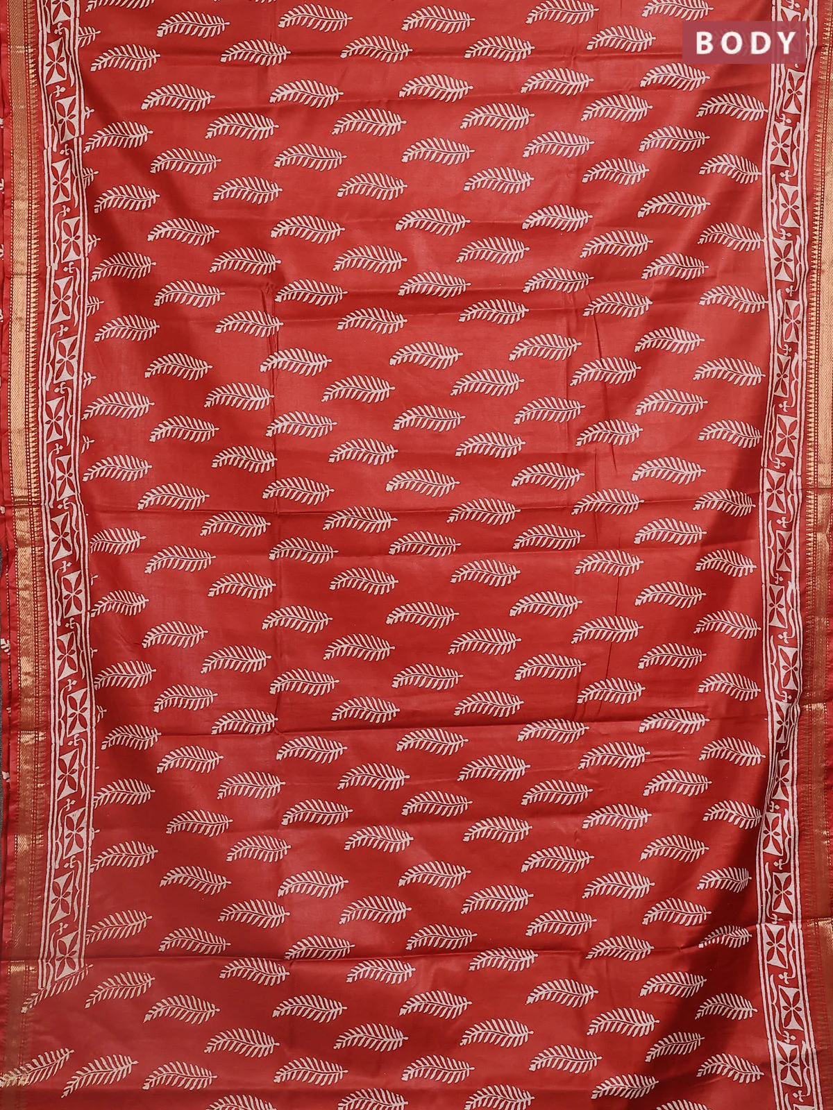 Semi bhagalpuri saree rust with allover prints and zari woven border - Image 2