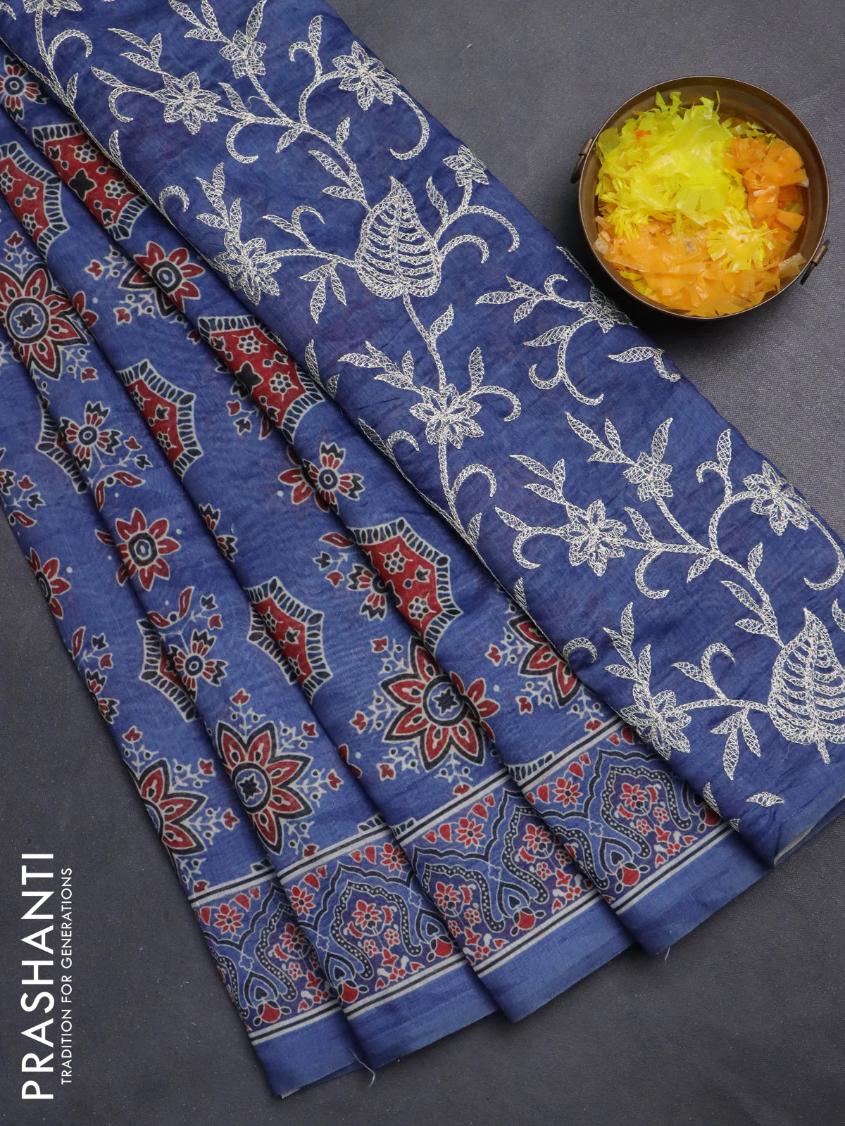 Semi chanderi saree blue with allover ajrakh prints and embroidery pallu