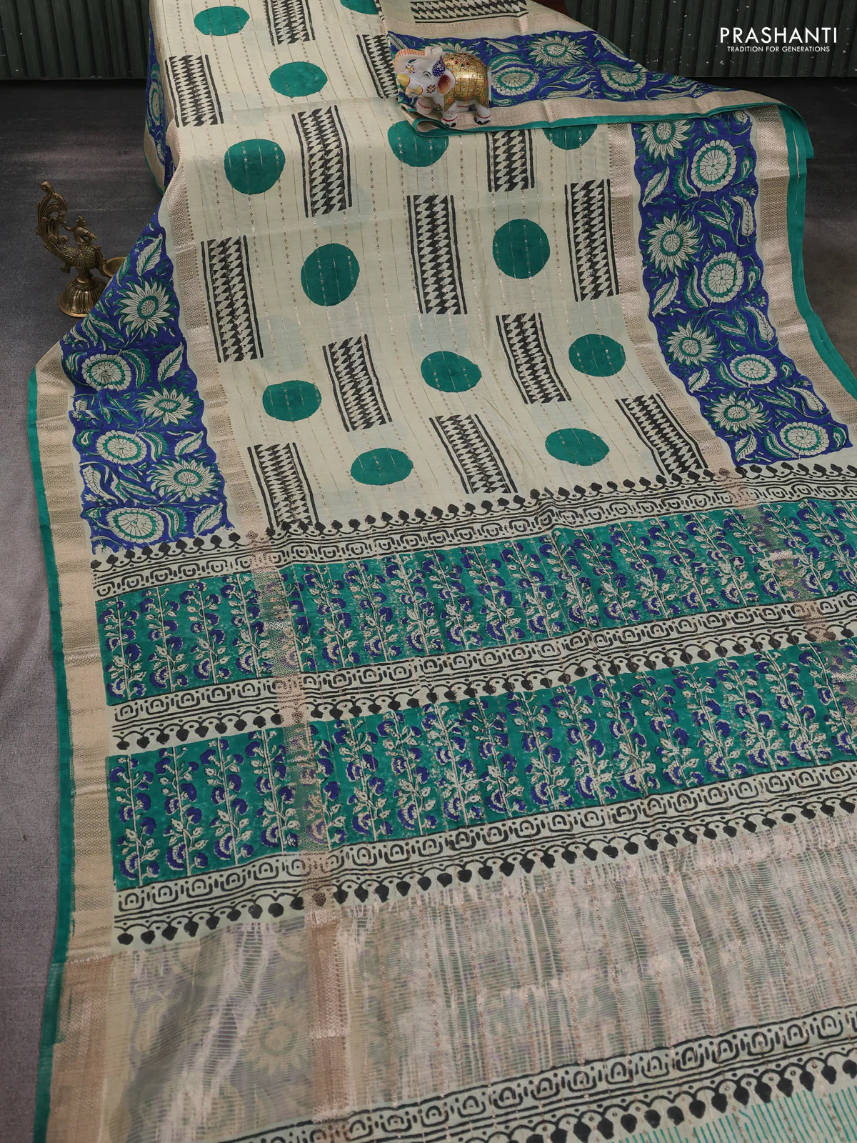 Semi chanderi saree cream and blue with allover zari weaves & geometric block prints and long printed border - Image 6
