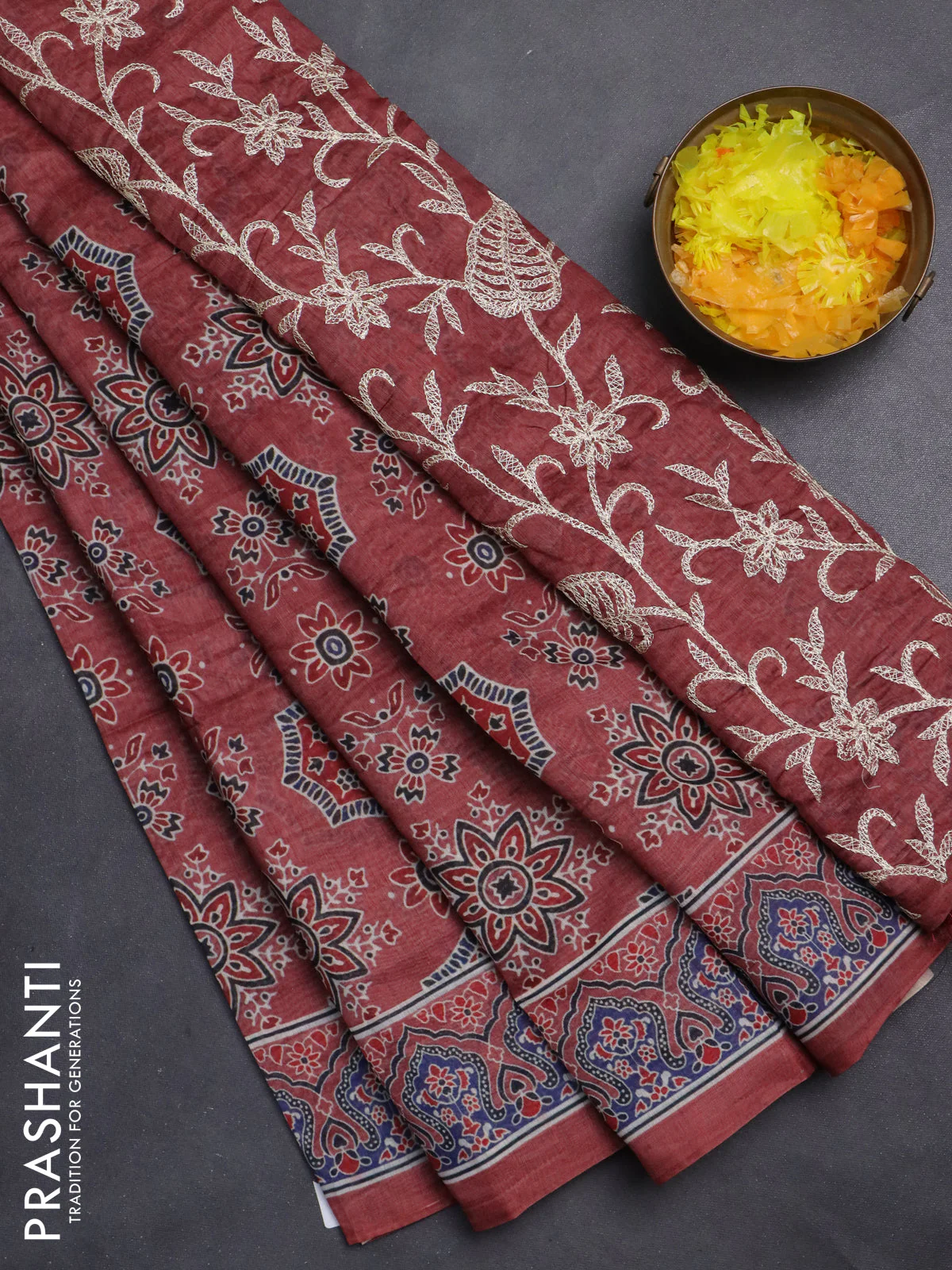 Semi chanderi saree maroon with allover ajrakh prints and embroidery pallu