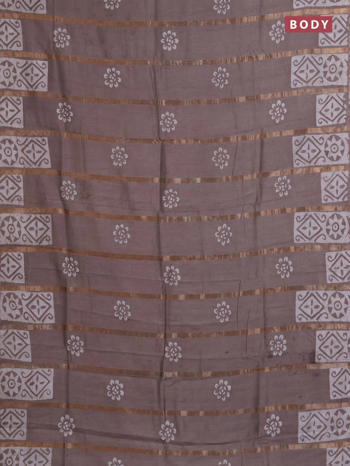 Semi chanderi saree pastel brown shade with allover zari strips & batik butta prints in borderless style - Image 2