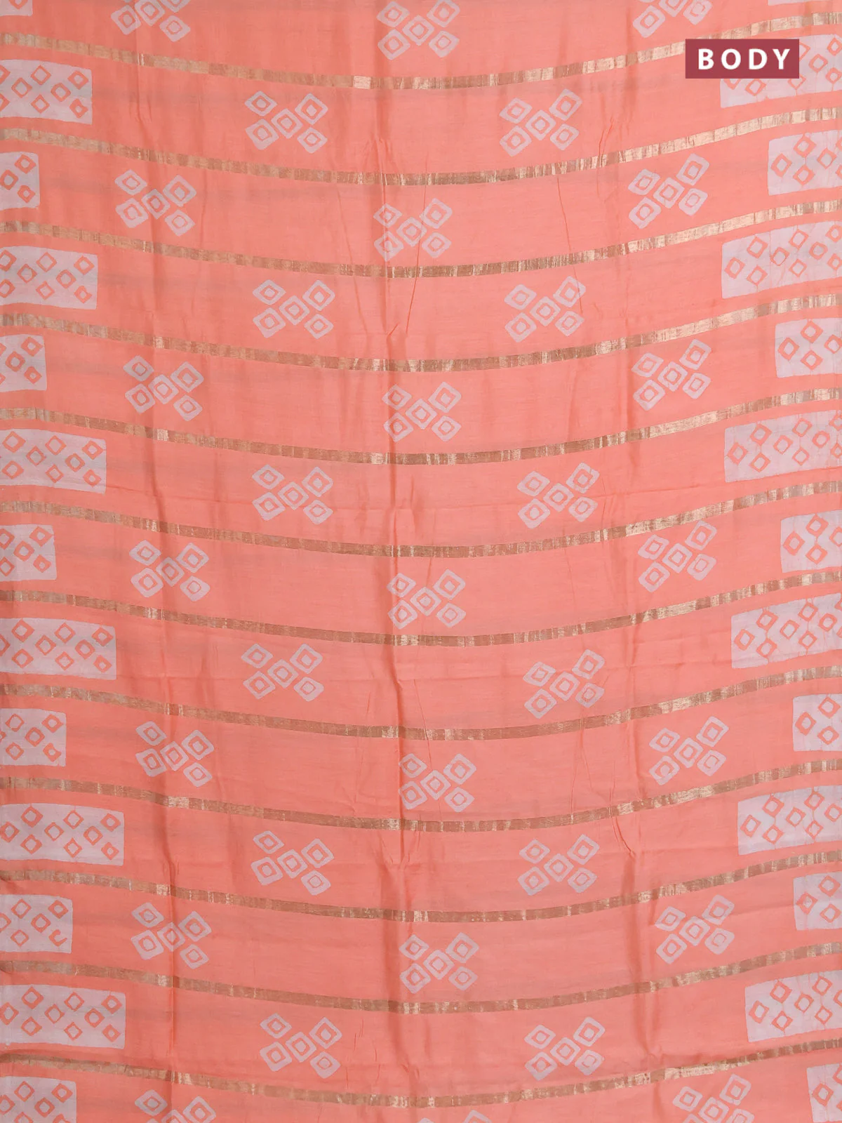 Semi chanderi saree peach orange with allover zari strips & batik butta prints in borderless style - Image 2