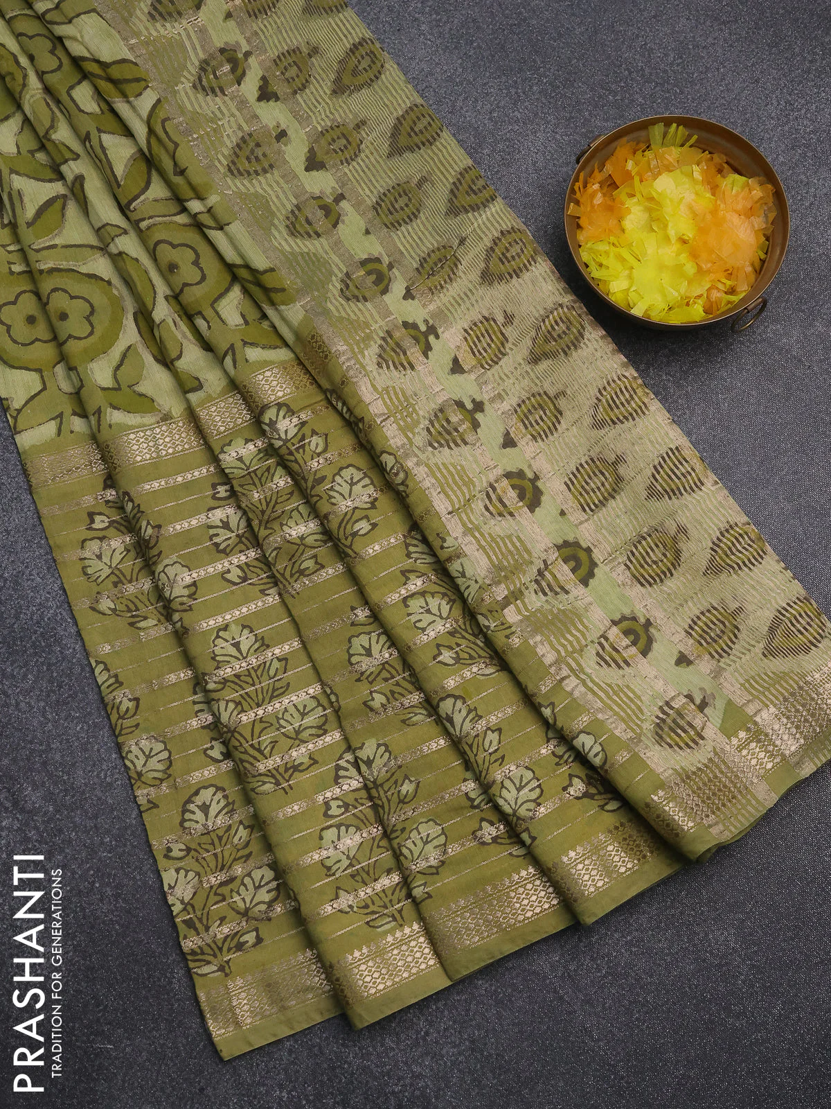 Semi chanderi saree pista green and green shade with allover ajrakh prints and long printed zari border
