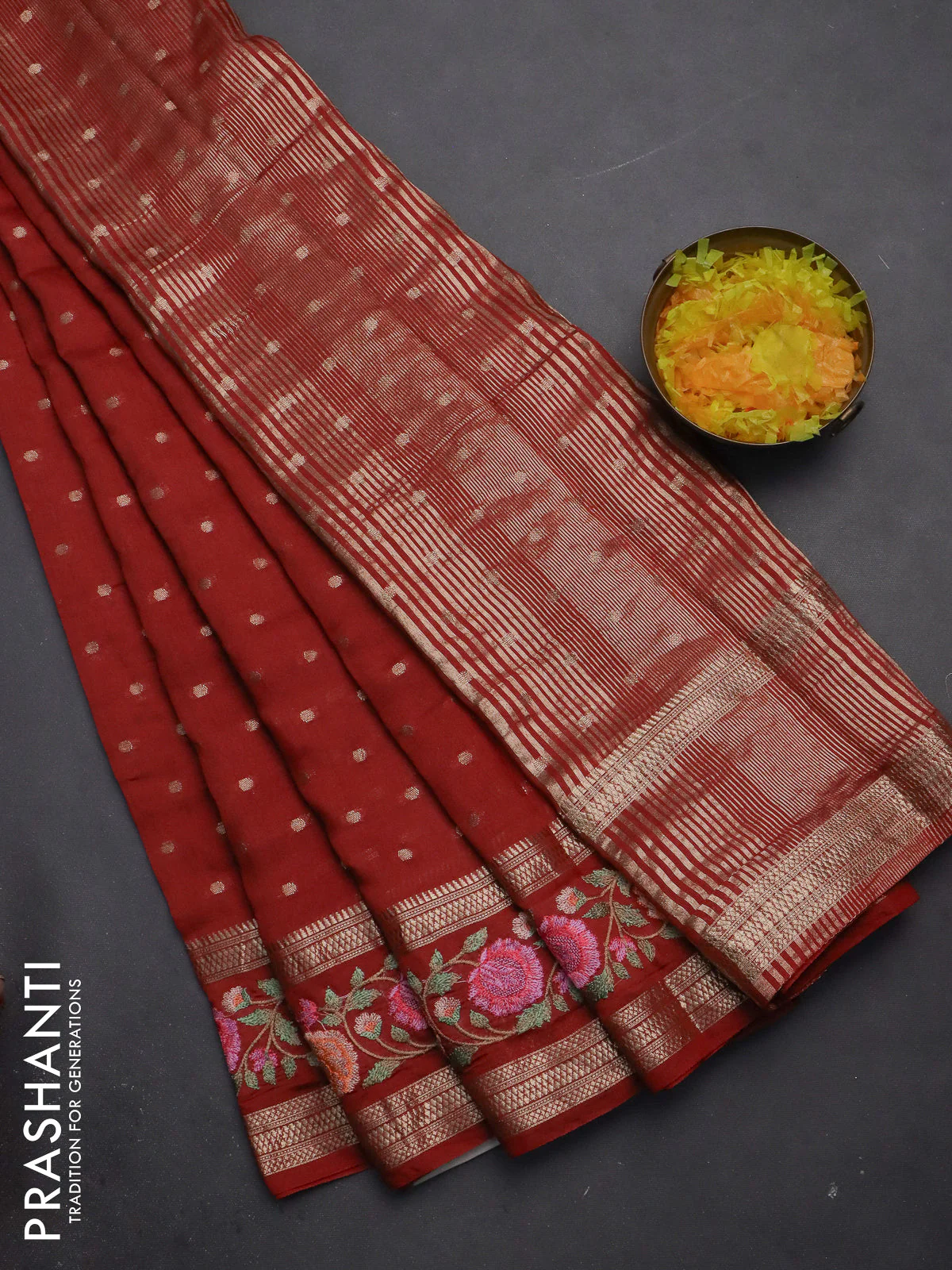 Semi chanderi saree rust shade with zari woven buttas and floral embroidery border