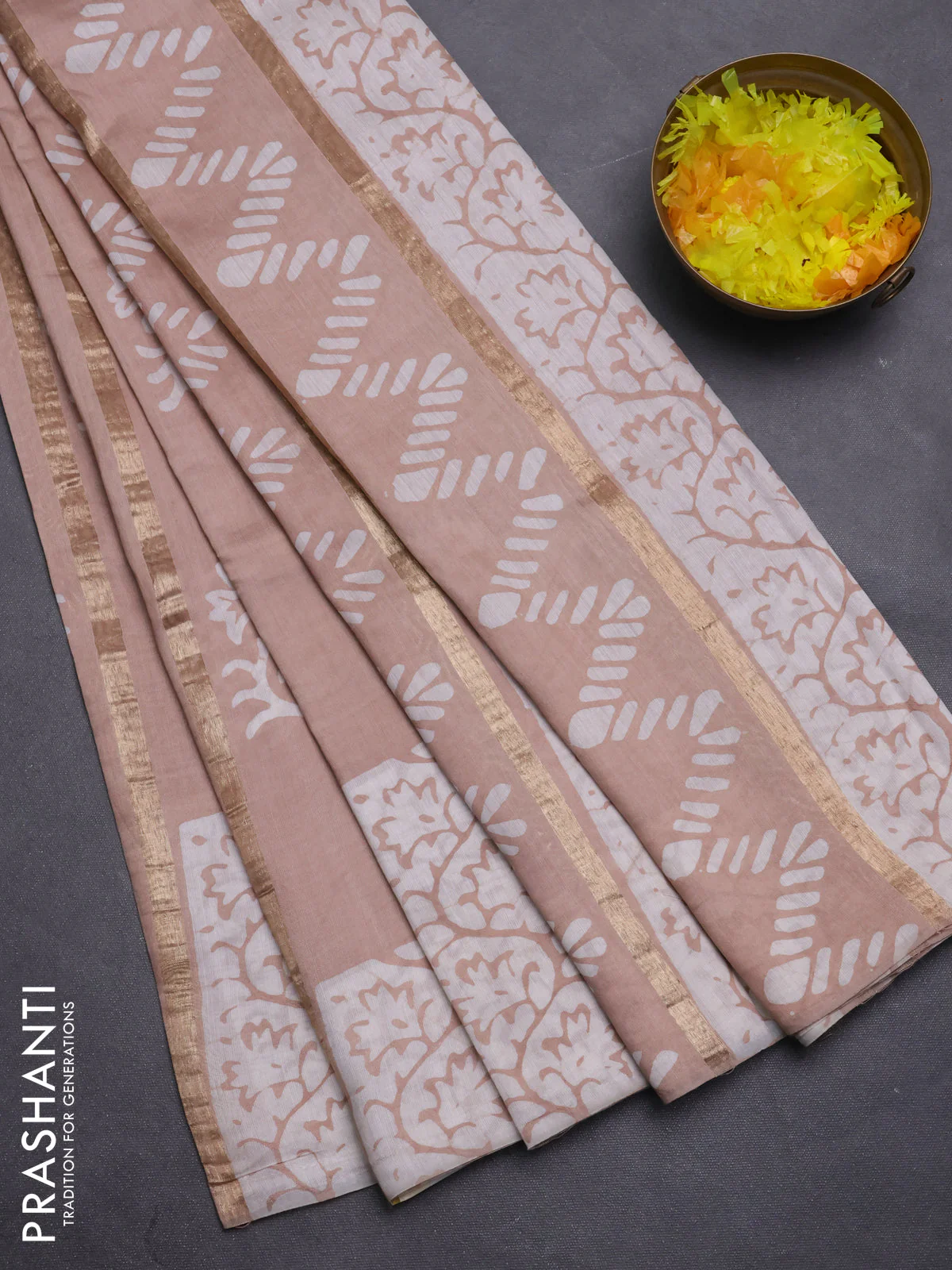 Semi chanderi saree sandal with allover zari strips & batik butta prints in borderless style