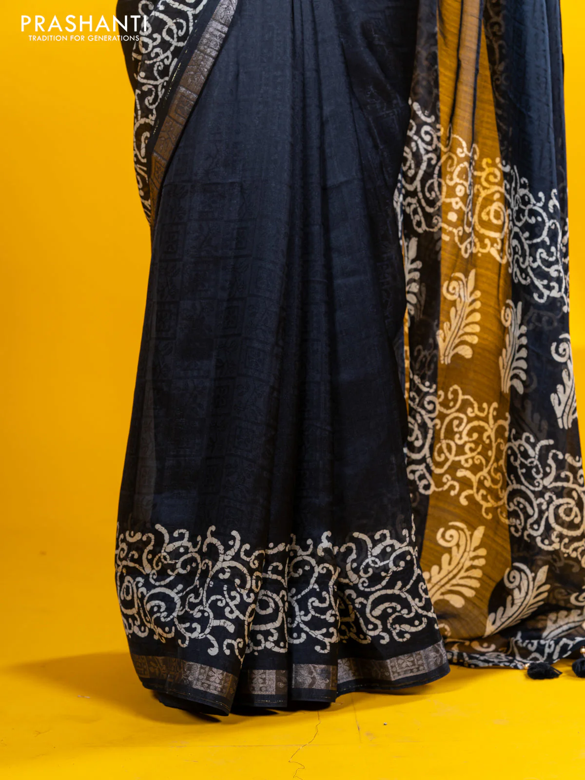 Semi crepe saree black with allover self emboss and batik printed border - Image 10