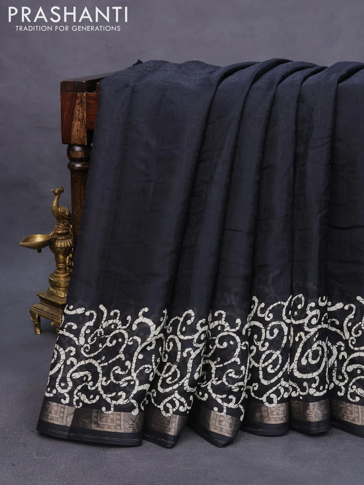 Semi crepe saree black with allover self emboss and batik printed border - Image 11