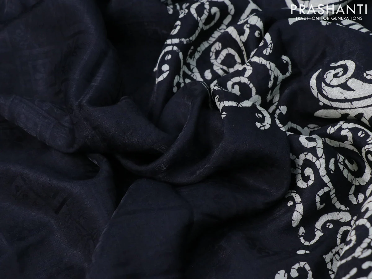 Semi crepe saree black with allover self emboss and batik printed border - Image 13