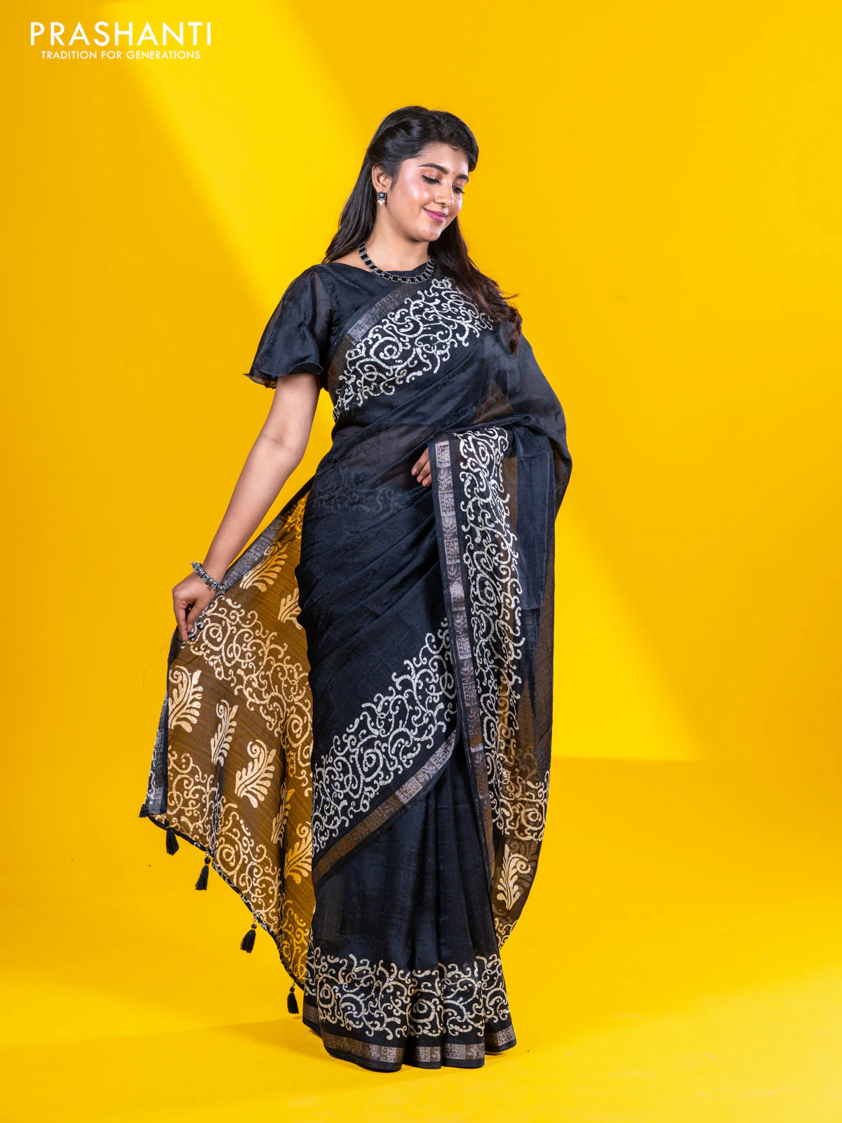 Semi crepe saree black with allover self emboss and batik printed border - Image 4