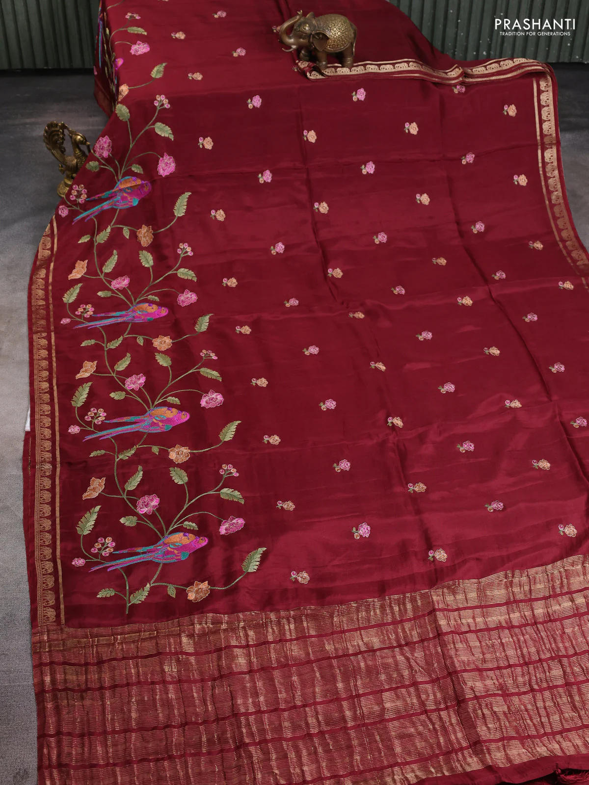 Semi crepe silk saree deep maroon with allover embroidery and elephant zari woven border - Image 2