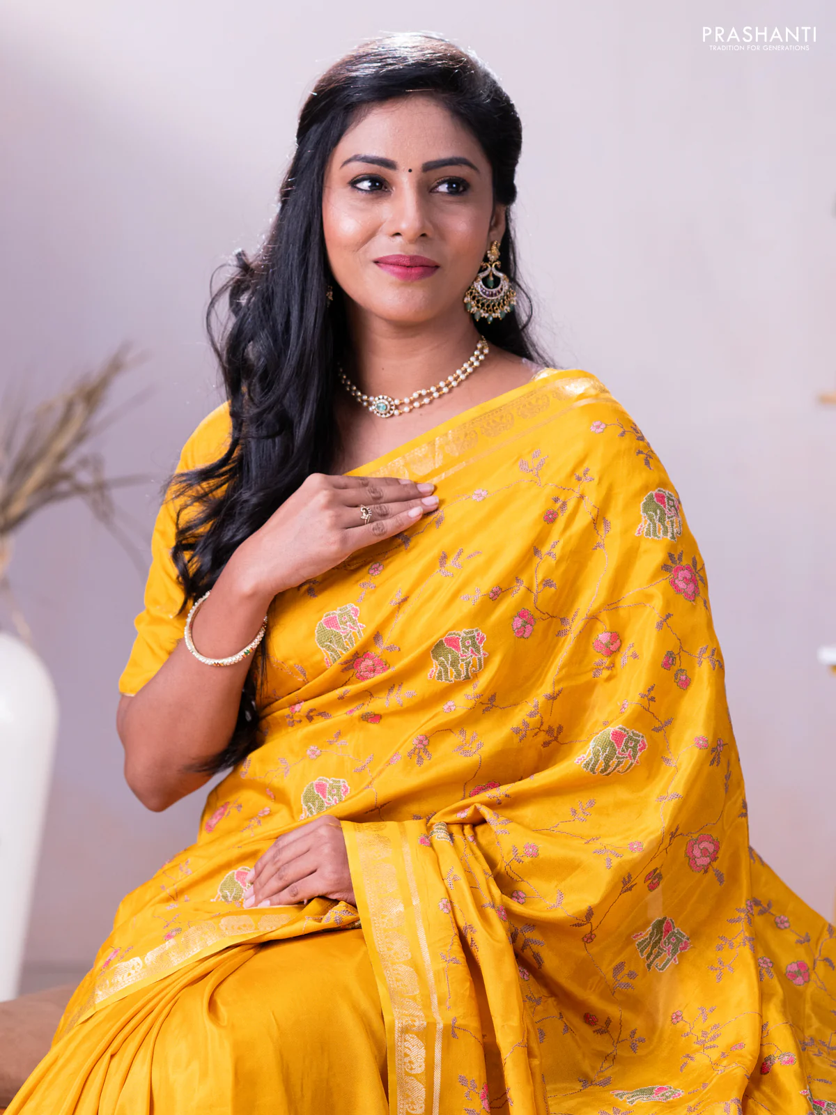 Semi crepe silk saree mustard yellow with allover convent embroidery and elephant zari woven border - Image 2