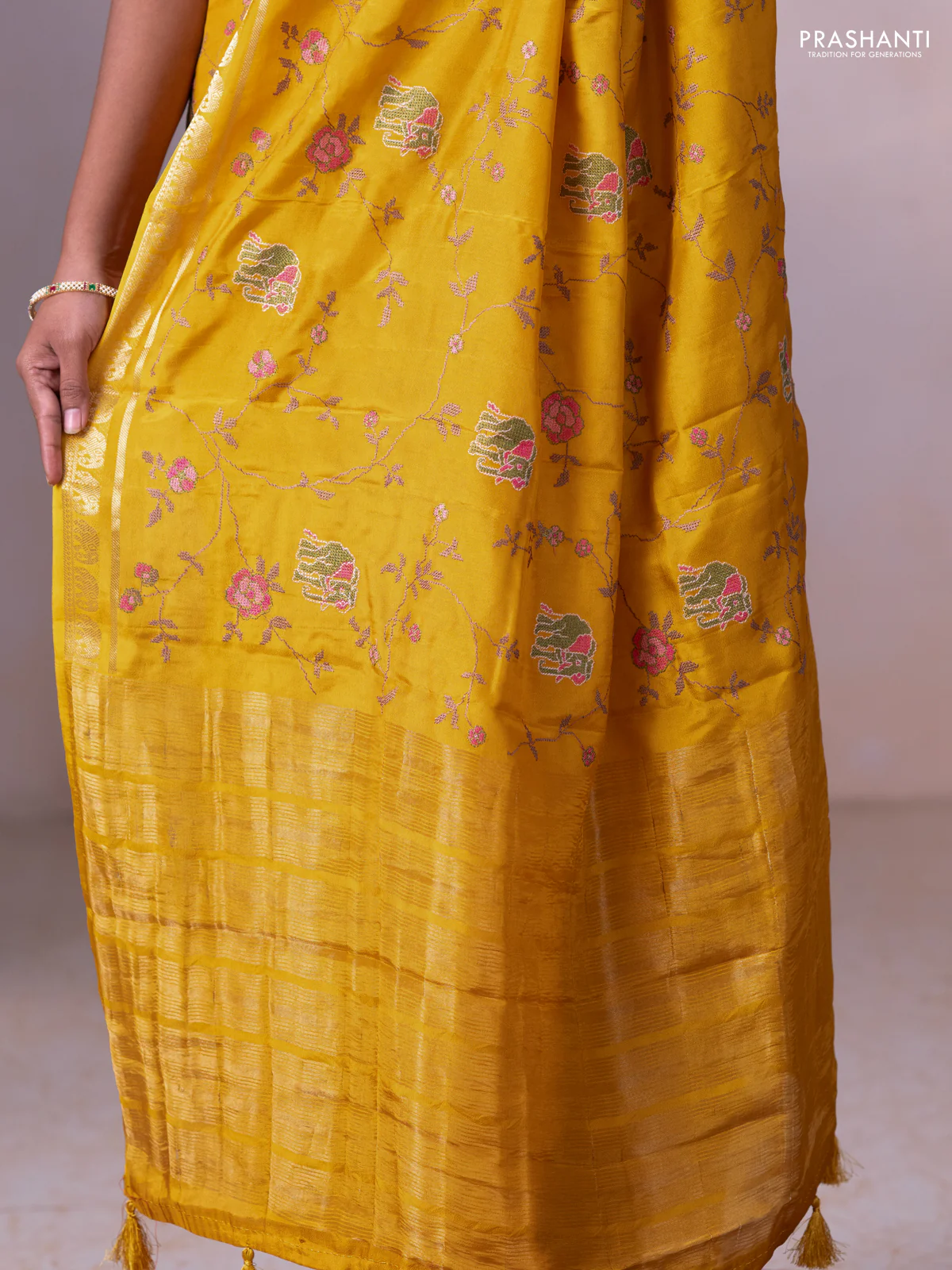 Semi crepe silk saree mustard yellow with allover convent embroidery and elephant zari woven border - Image 5