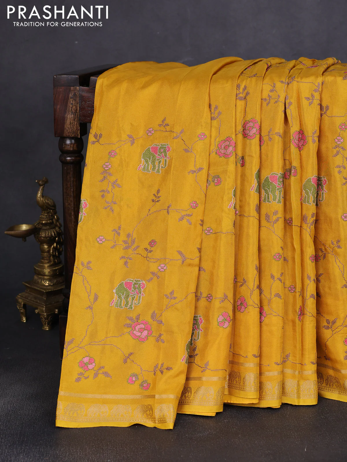 Semi crepe silk saree mustard yellow with allover convent embroidery and elephant zari woven border - Image 6